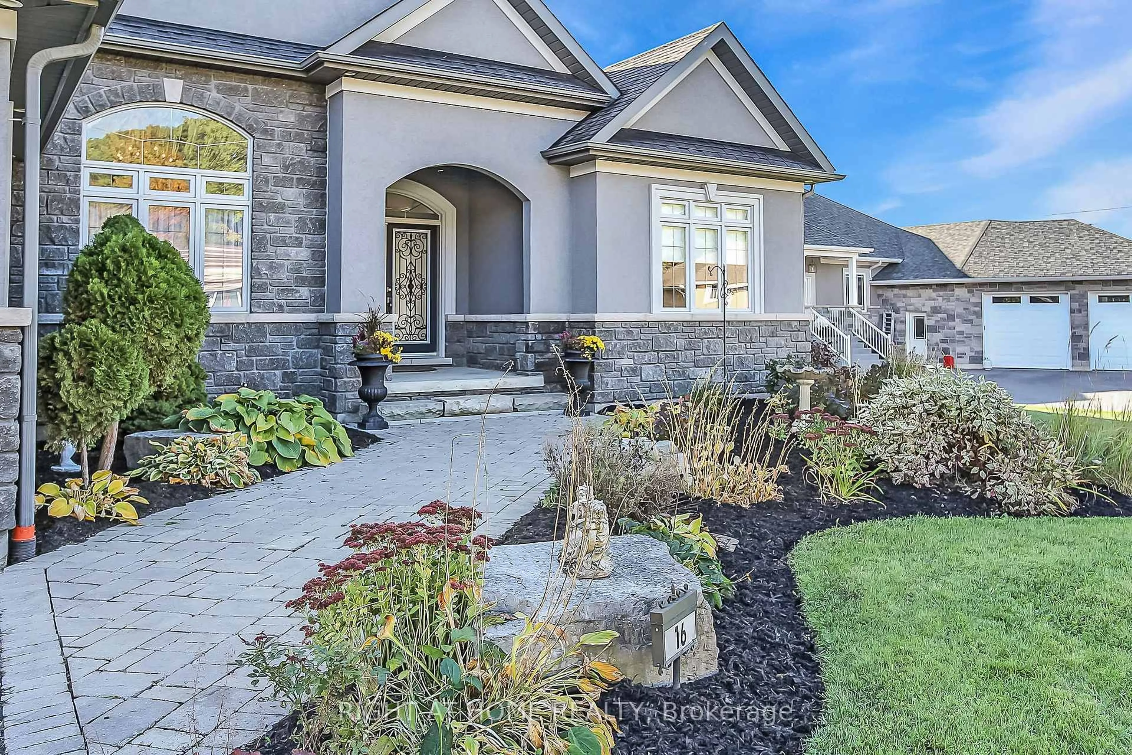 Home with brick exterior material, street for 16 Deanna Dr, Wasaga Beach Ontario L9Z 1J5