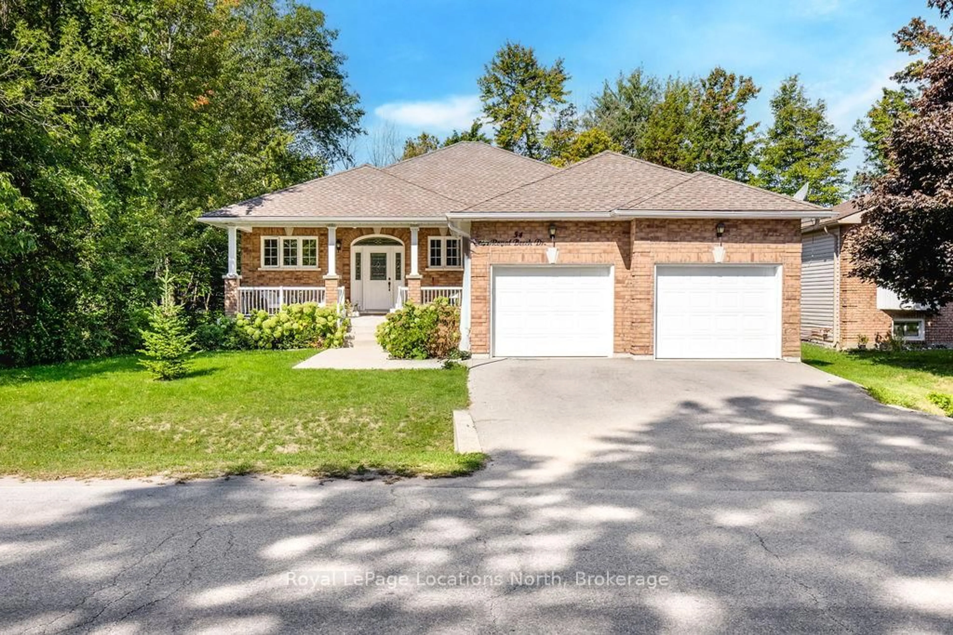 Home with brick exterior material, street for 54 ROYAL BEECH Dr, Wasaga Beach Ontario L9Z 1H3