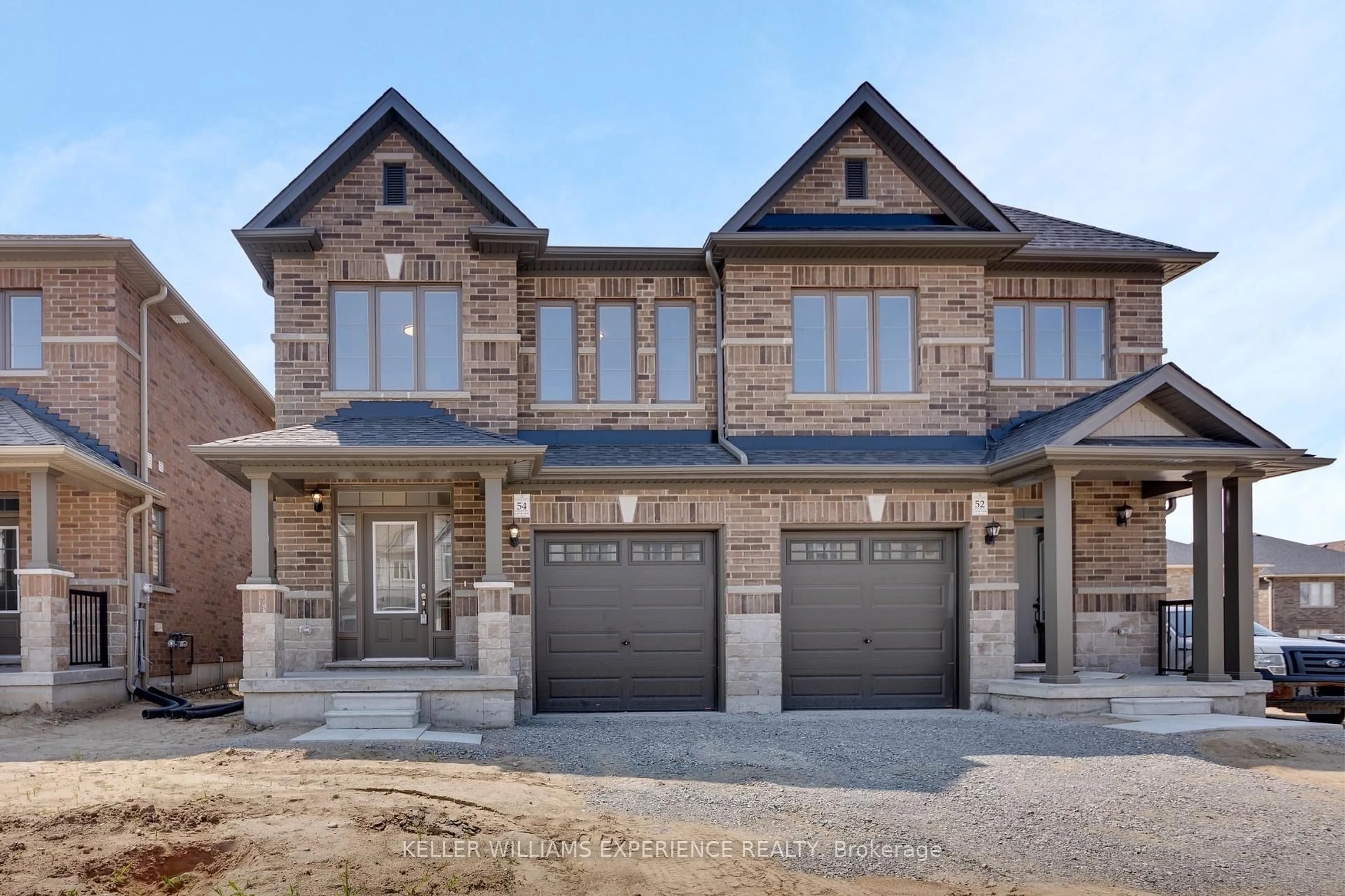 Home with brick exterior material, street for 54 Sagewood Ave, Barrie Ontario L9J 0K5