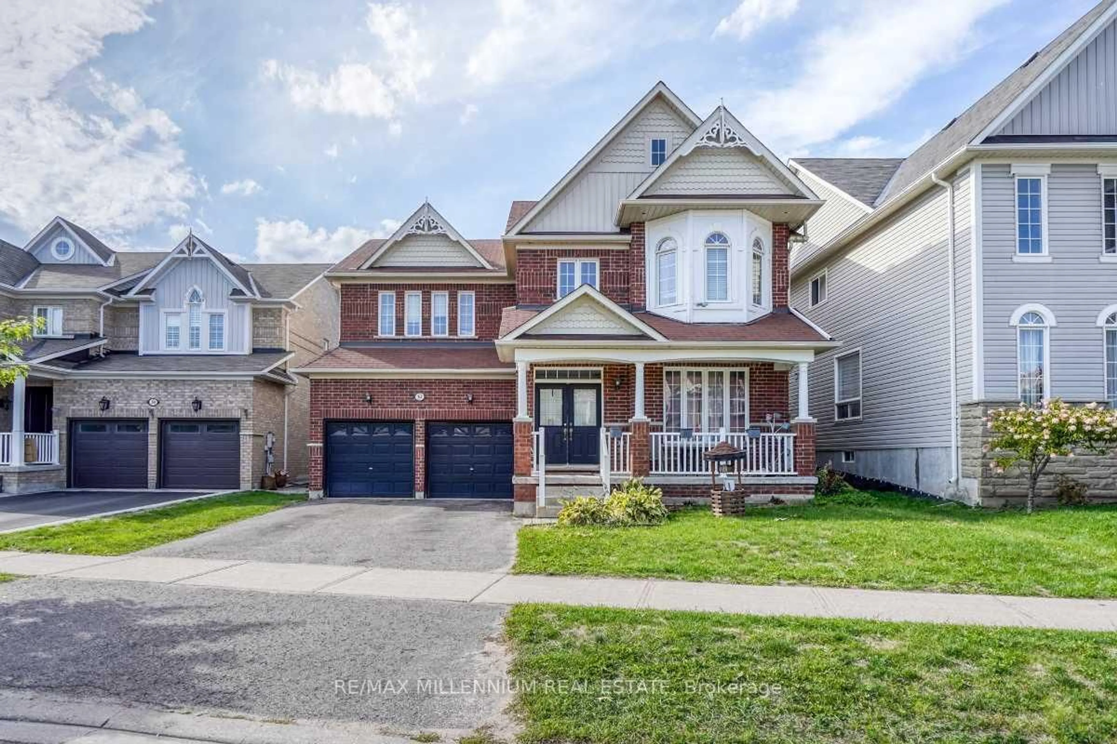 Home with brick exterior material, street for 52 The Queens Way, Barrie Ontario L4M 7J3