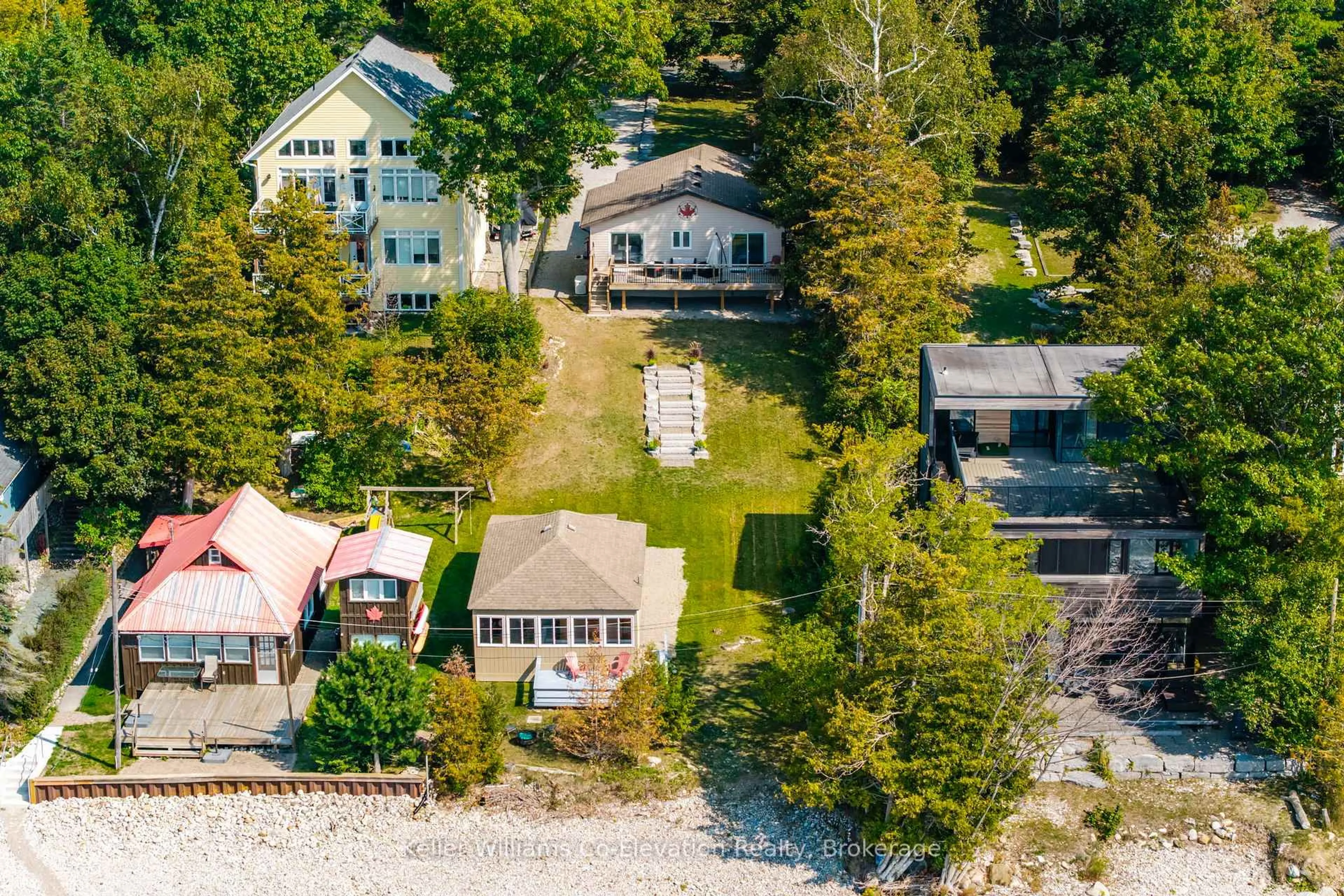 A pic from outside/outdoor area/front of a property/back of a property/a pic from drone, water/lake/river/ocean view for 1948 Tiny Beaches Road South Rd, Tiny Ontario L0L 1P1
