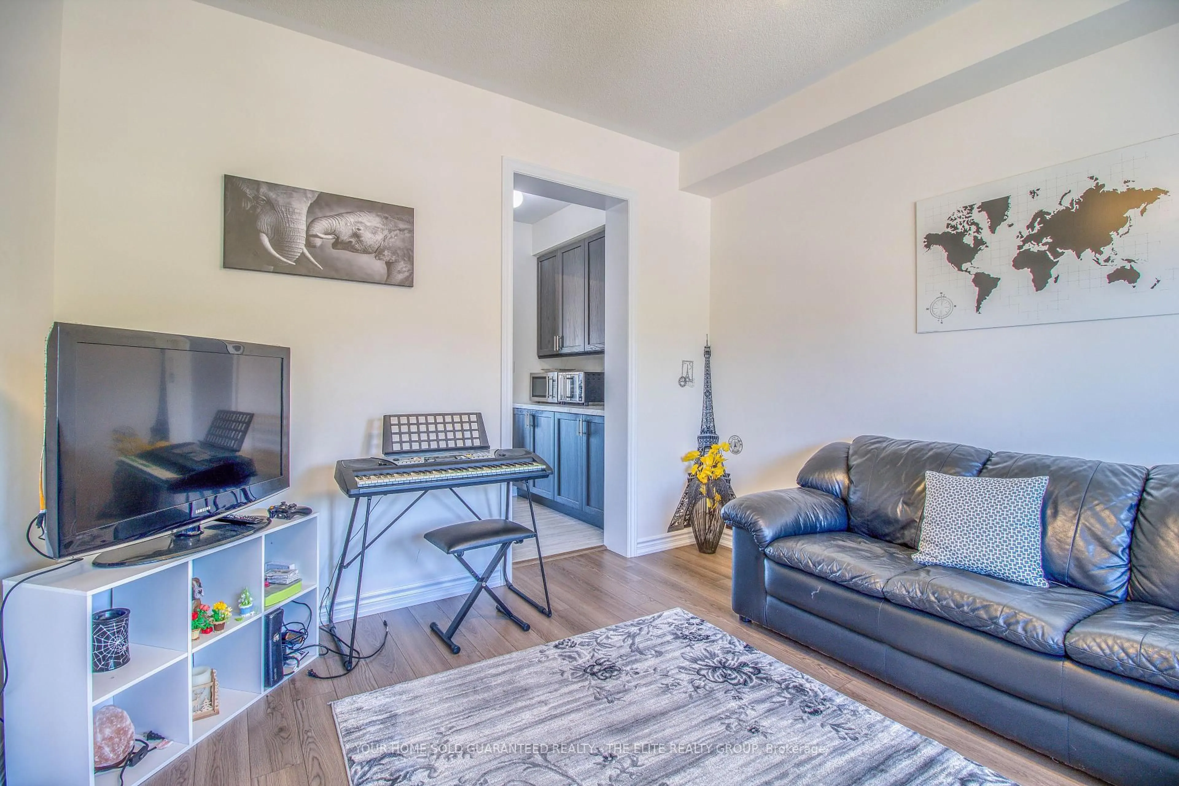 Living room with furniture, wood/laminate floor for 211 Lia Dr, Clearview Ontario L0M 1S0