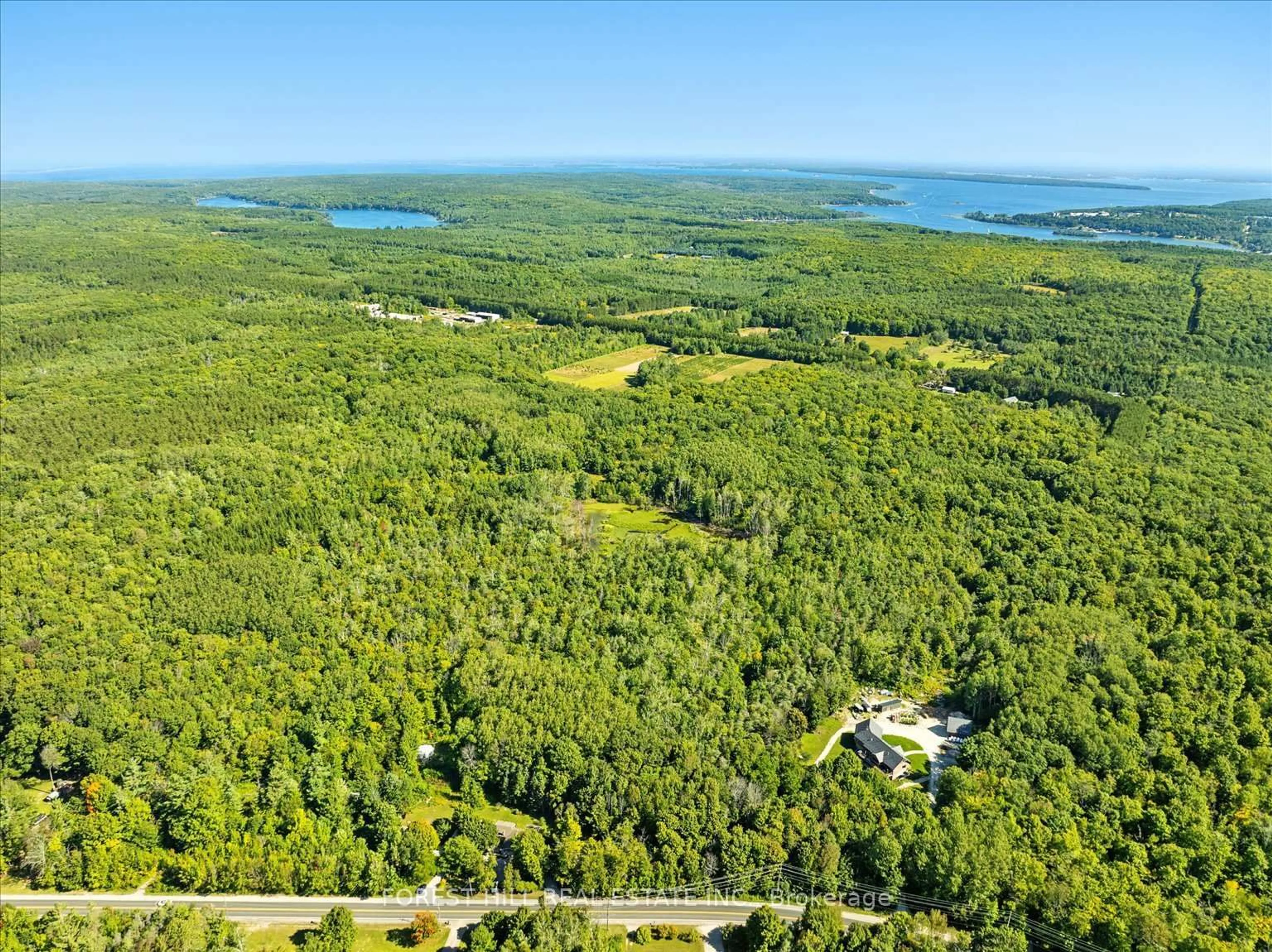 A pic from outside/outdoor area/front of a property/back of a property/a pic from drone, water/lake/river/ocean view for 590 Lafontaine Rd, Tiny Ontario L9M 0S4