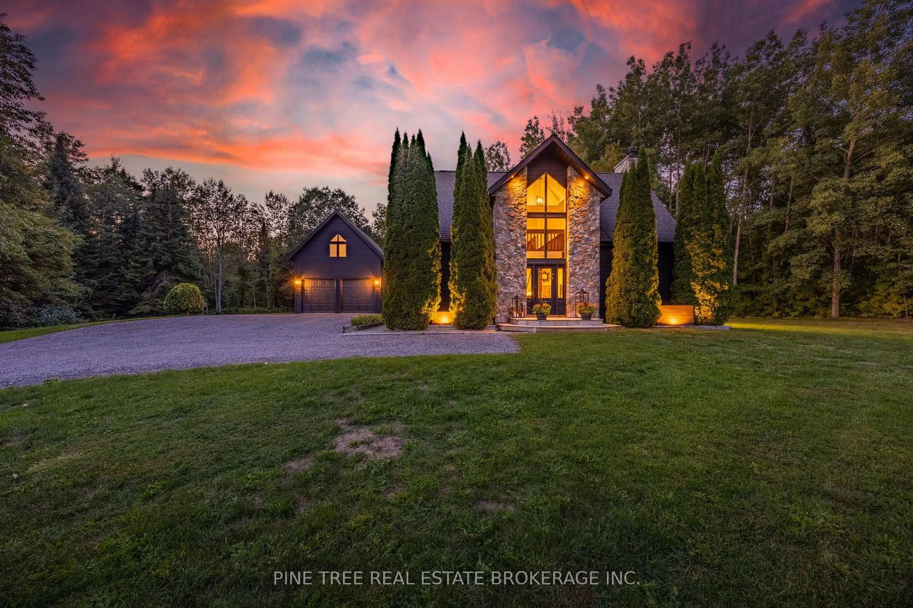 A pic from outside/outdoor area/front of a property/back of a property/a pic from drone, unknown for 3328 Flos Road 6 Rd, Springwater Ontario L0L 2K0