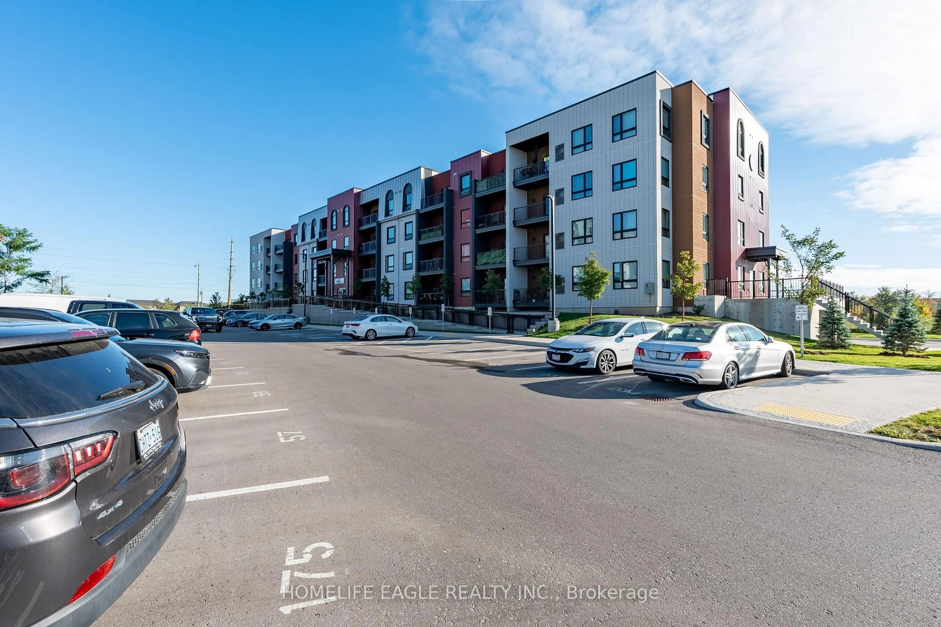 A pic from outside/outdoor area/front of a property/back of a property/a pic from drone, street for 1 Chef Lane #201, Barrie Ontario L9J 0T1