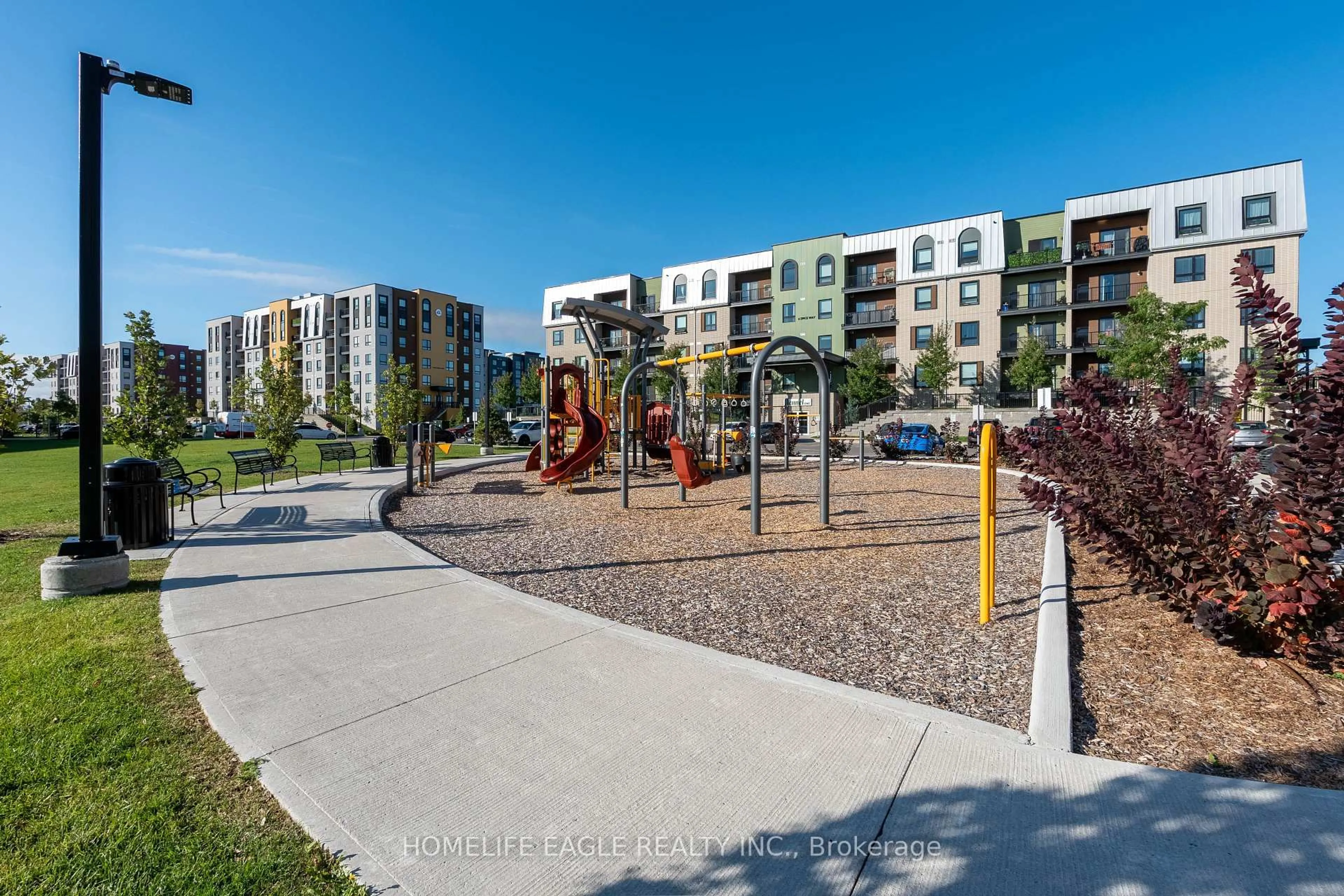 A pic from outside/outdoor area/front of a property/back of a property/a pic from drone, street for 1 Chef Lane #201, Barrie Ontario L9J 0T1