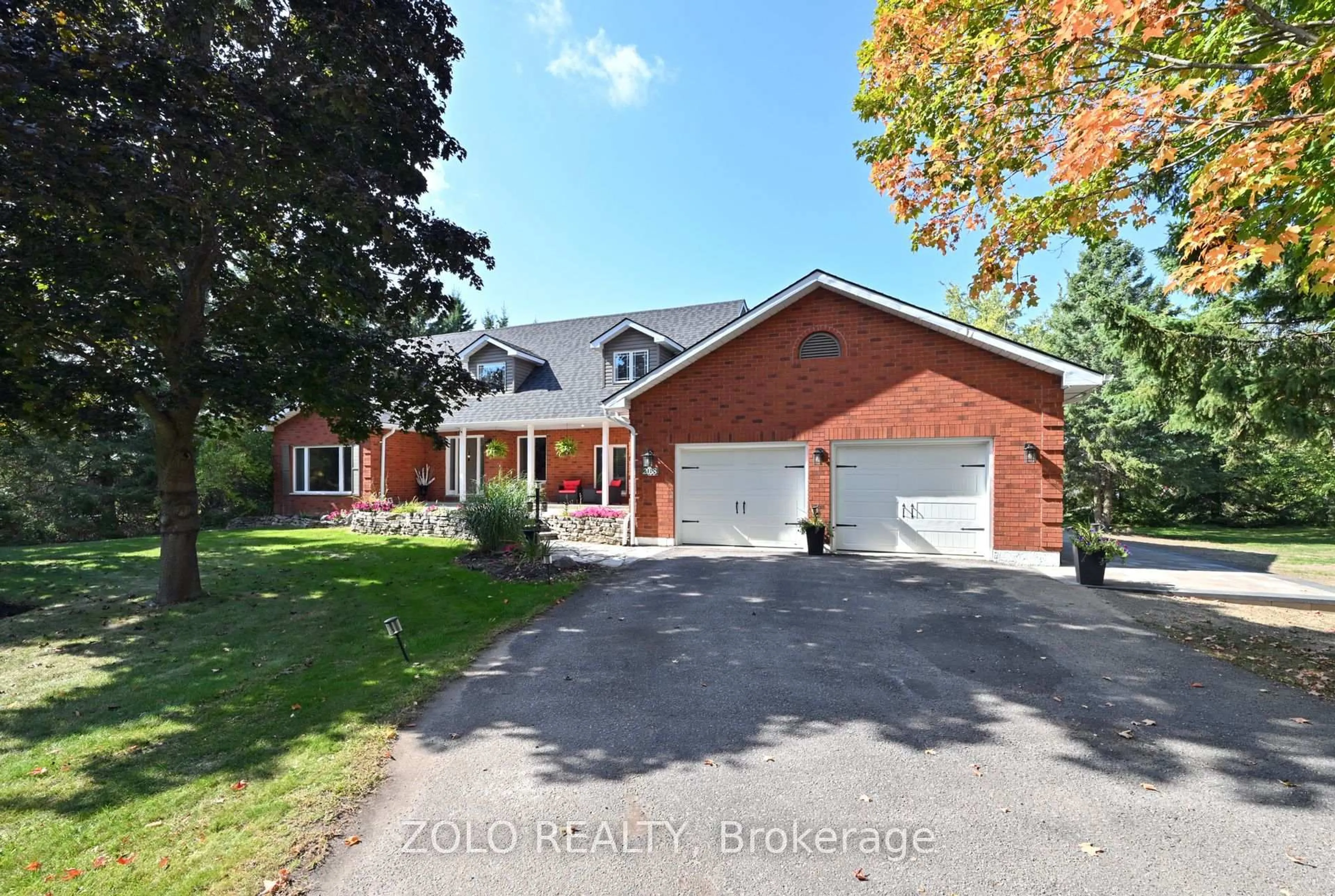 A pic from outside/outdoor area/front of a property/back of a property/a pic from drone, street for 2038 SNOW VALLEY Rd, Springwater Ontario L9X 1J6