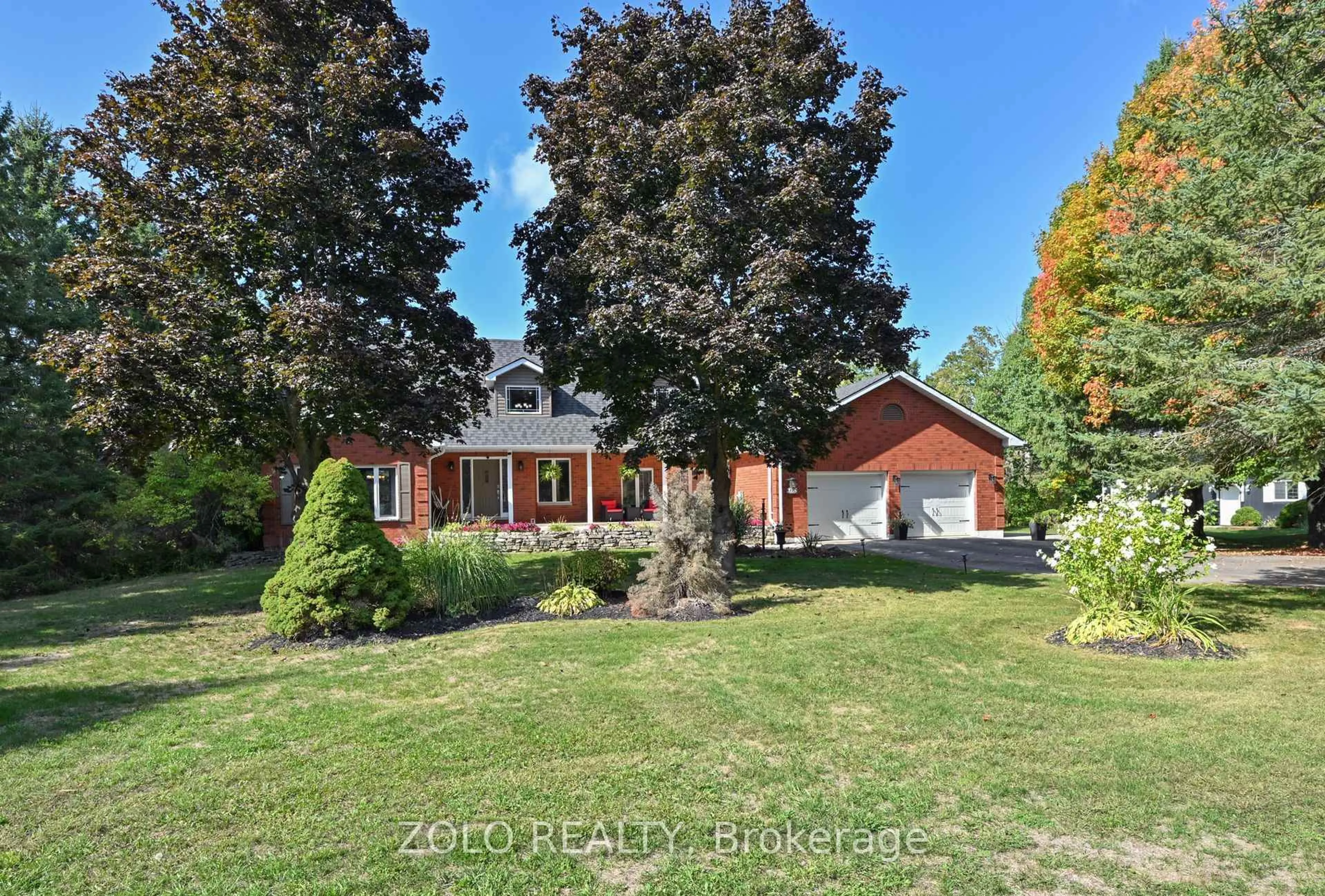 A pic from outside/outdoor area/front of a property/back of a property/a pic from drone, street for 2038 SNOW VALLEY Rd, Springwater Ontario L9X 1J6