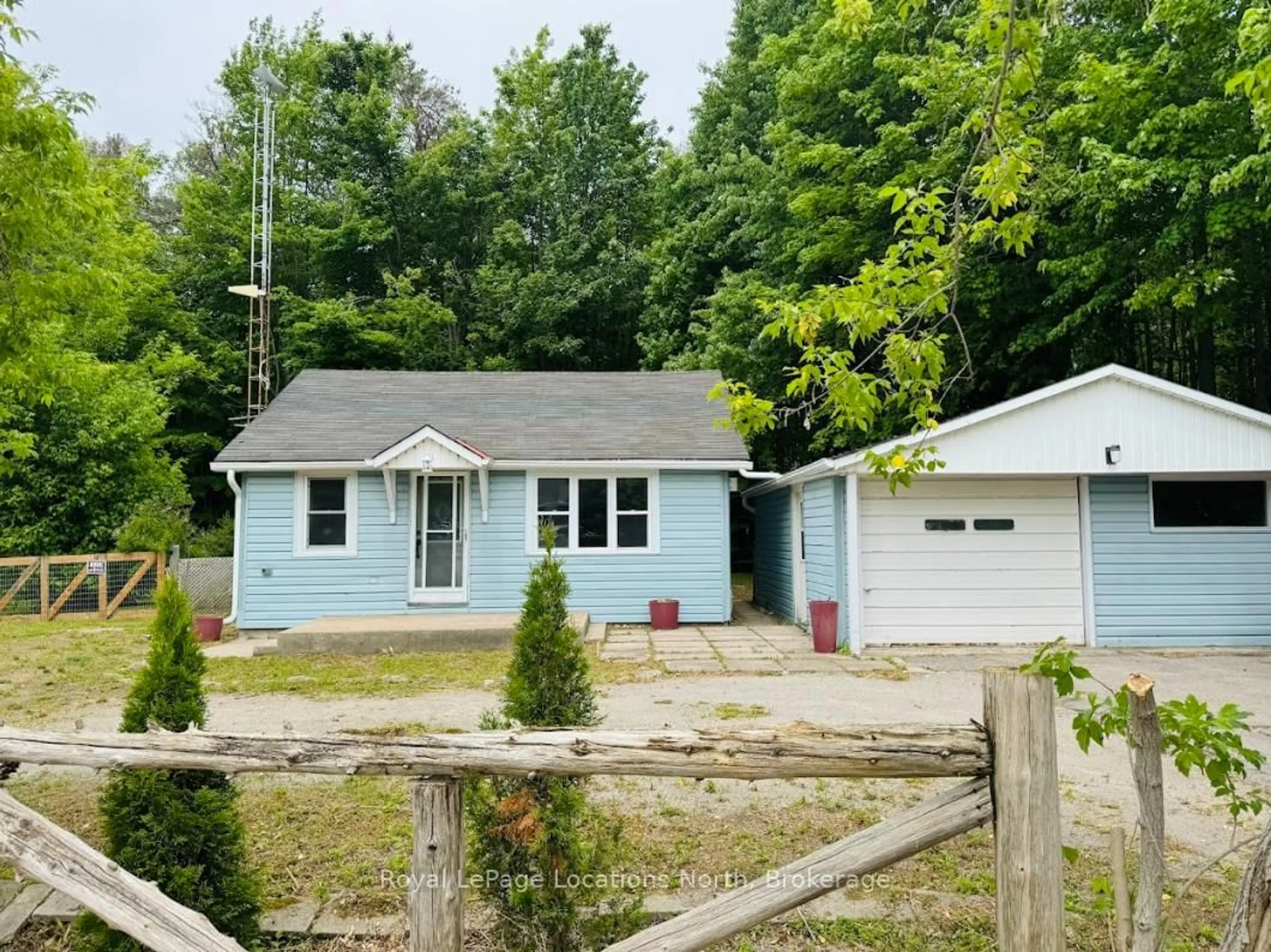 A pic from outside/outdoor area/front of a property/back of a property/a pic from drone, street for 80 Concession 8 Rd, Tiny Ontario L0L 2J0