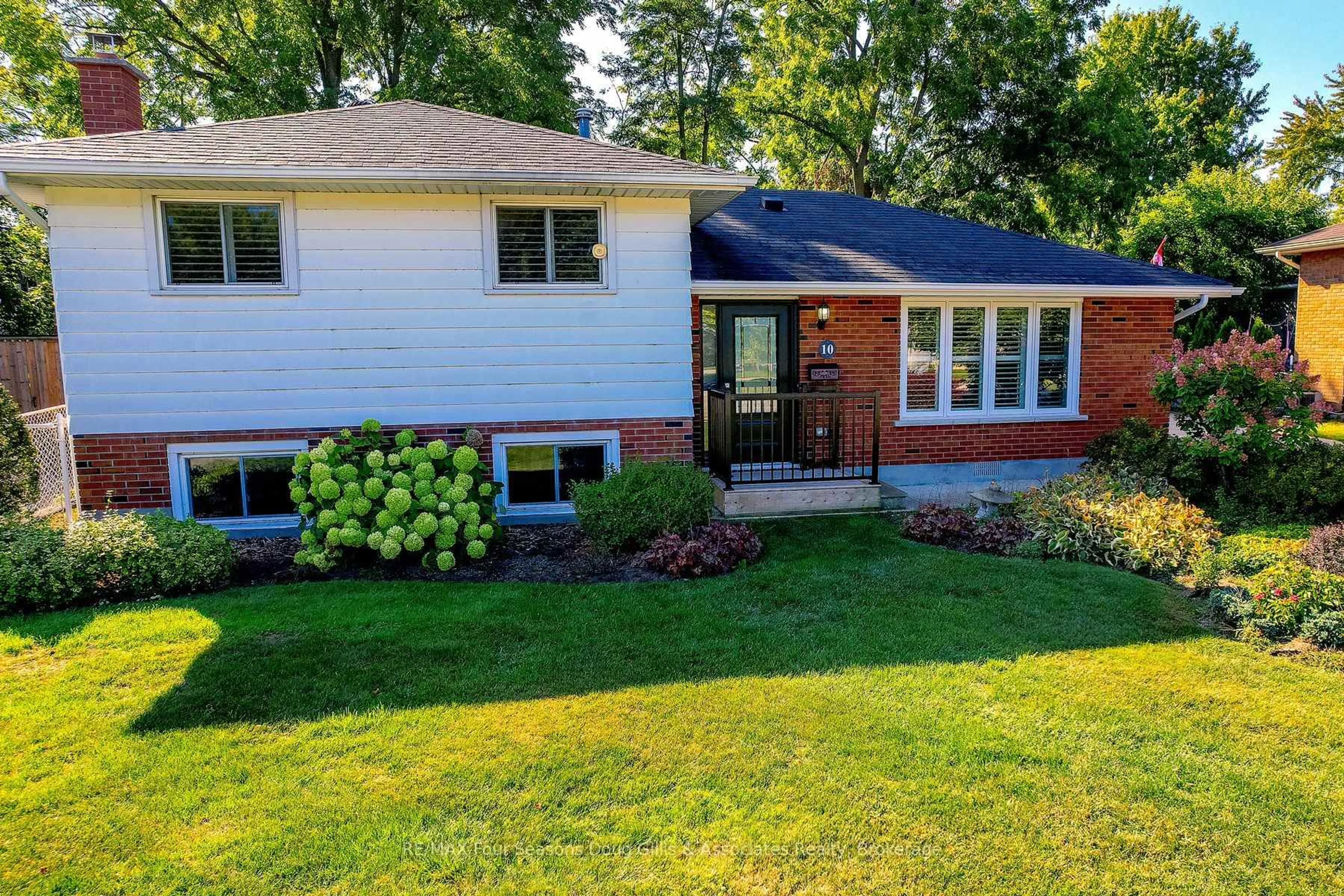 Home with brick exterior material, street for 10 Lockhart Rd, Collingwood Ontario L9Y 4B5