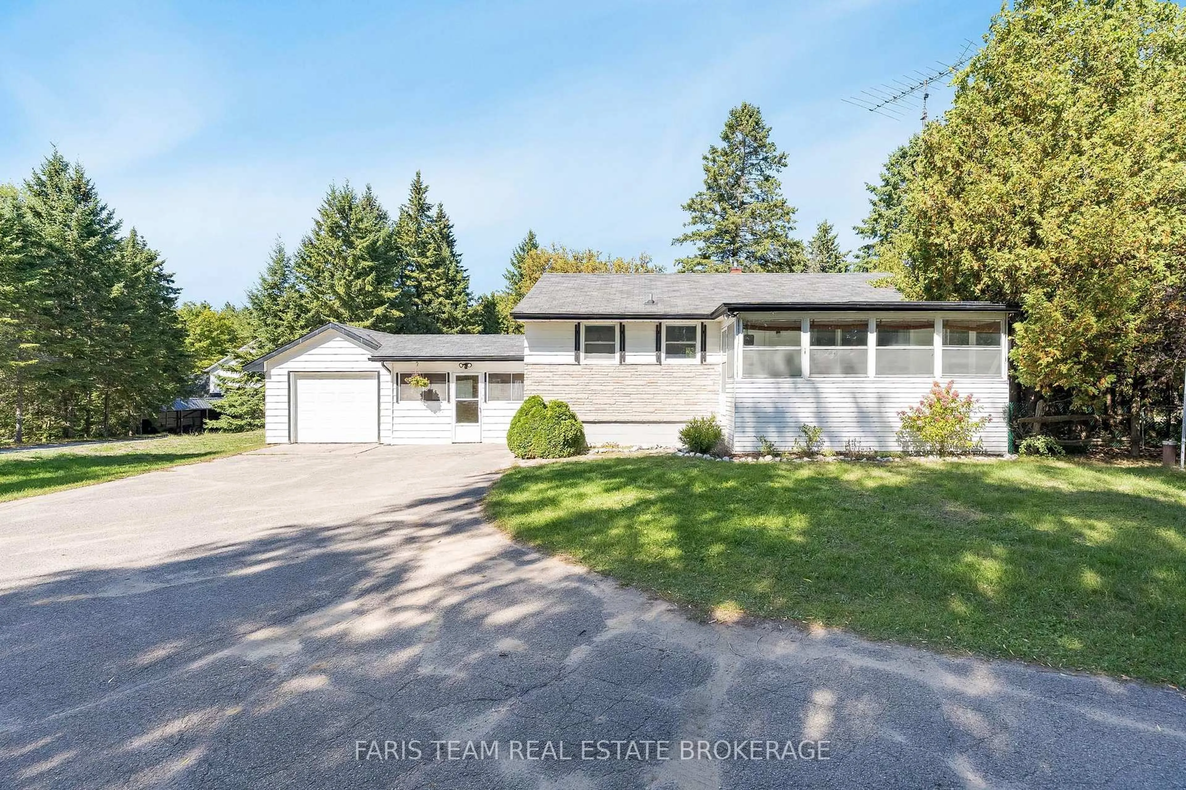 A pic from outside/outdoor area/front of a property/back of a property/a pic from drone, street for 2570 Sunnidale Rd, Springwater Ontario L0M 1T2