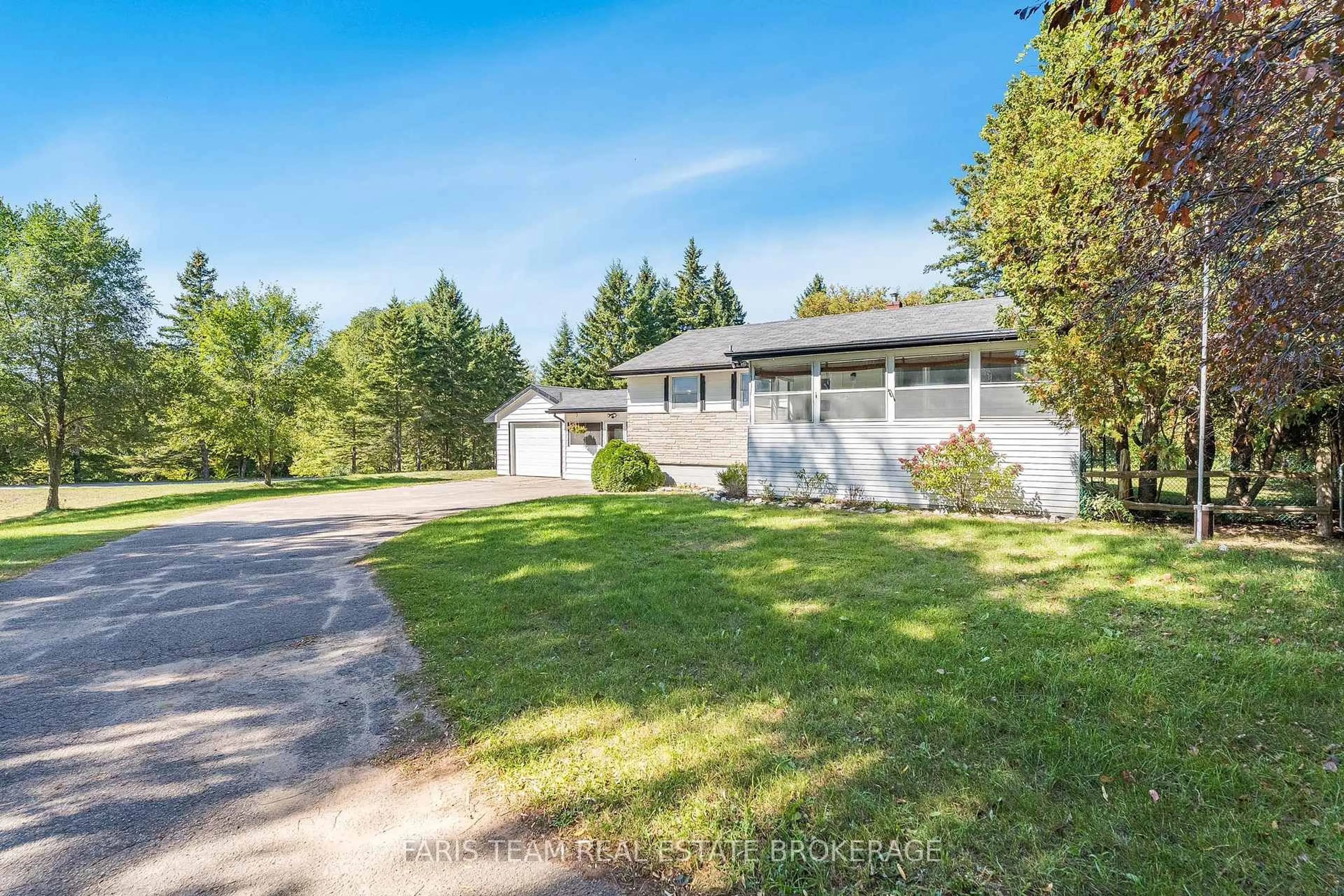 A pic from outside/outdoor area/front of a property/back of a property/a pic from drone, unknown for 2570 Sunnidale Rd, Springwater Ontario L0M 1T2