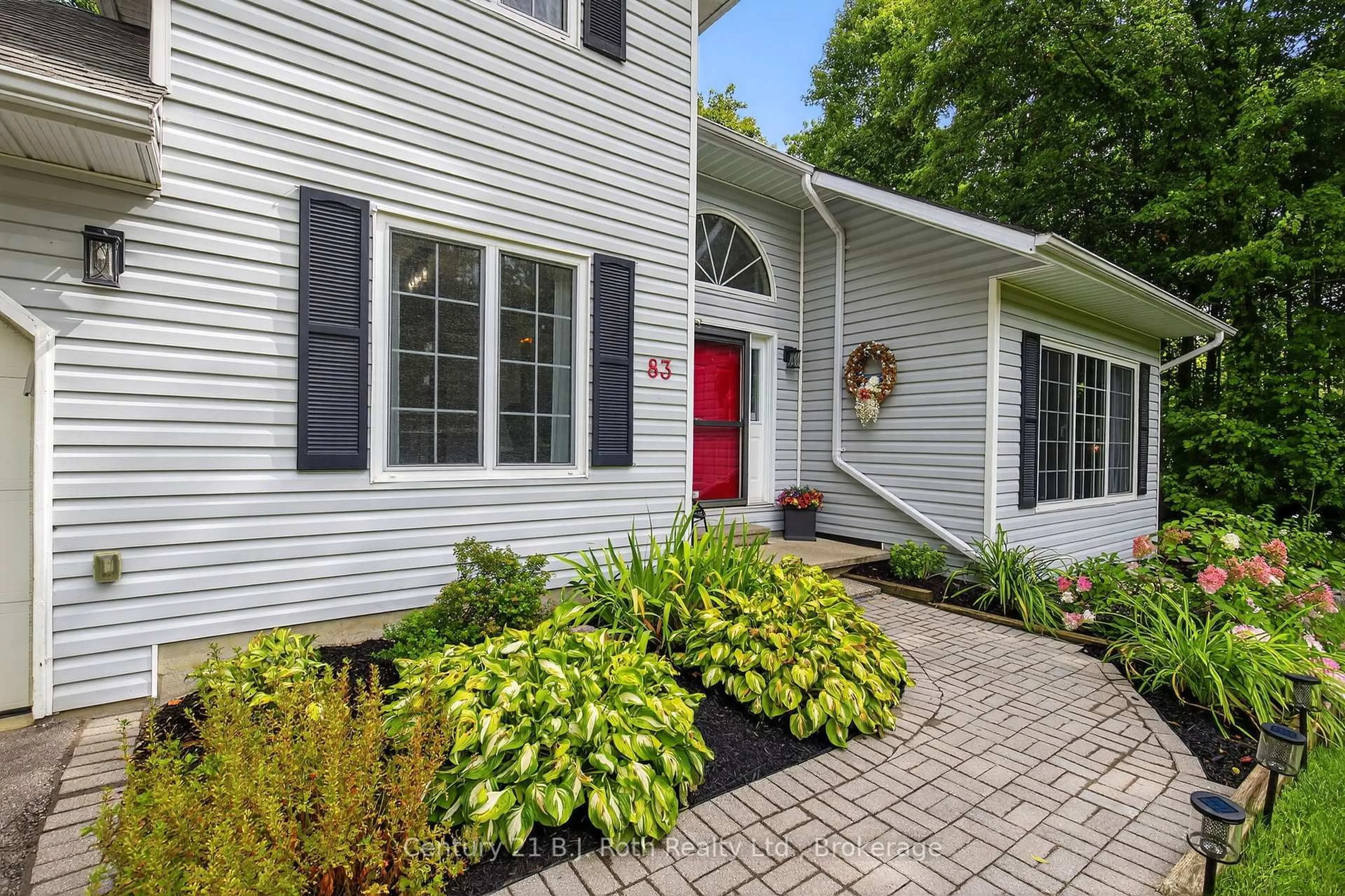 Home with vinyl exterior material, street for 83 Wozniak Rd, Penetanguishene Ontario L9M 1W6