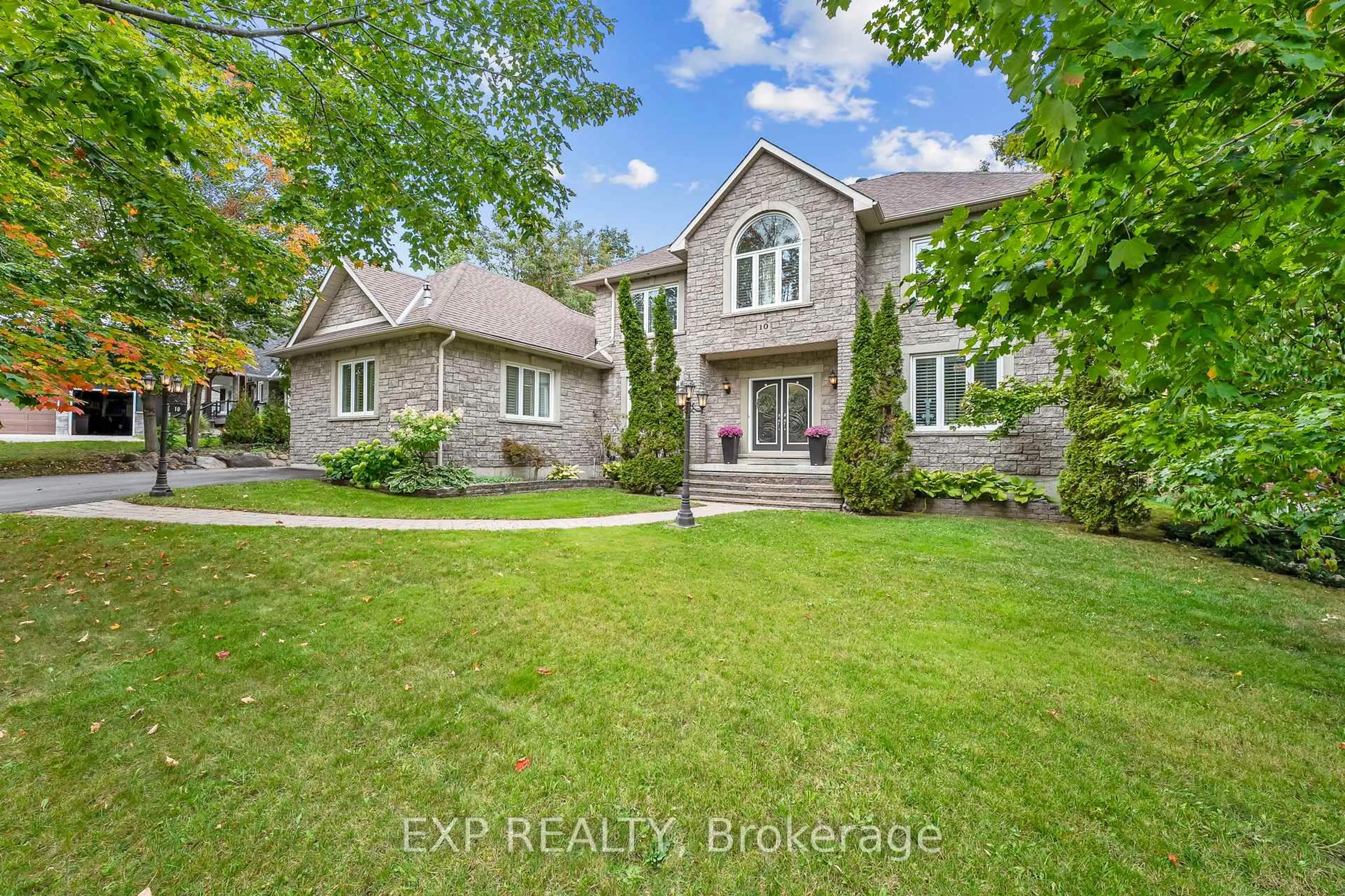 A pic from outside/outdoor area/front of a property/back of a property/a pic from drone, street for 10 Nordic Tr, Oro-Medonte Ontario L0L 2L0