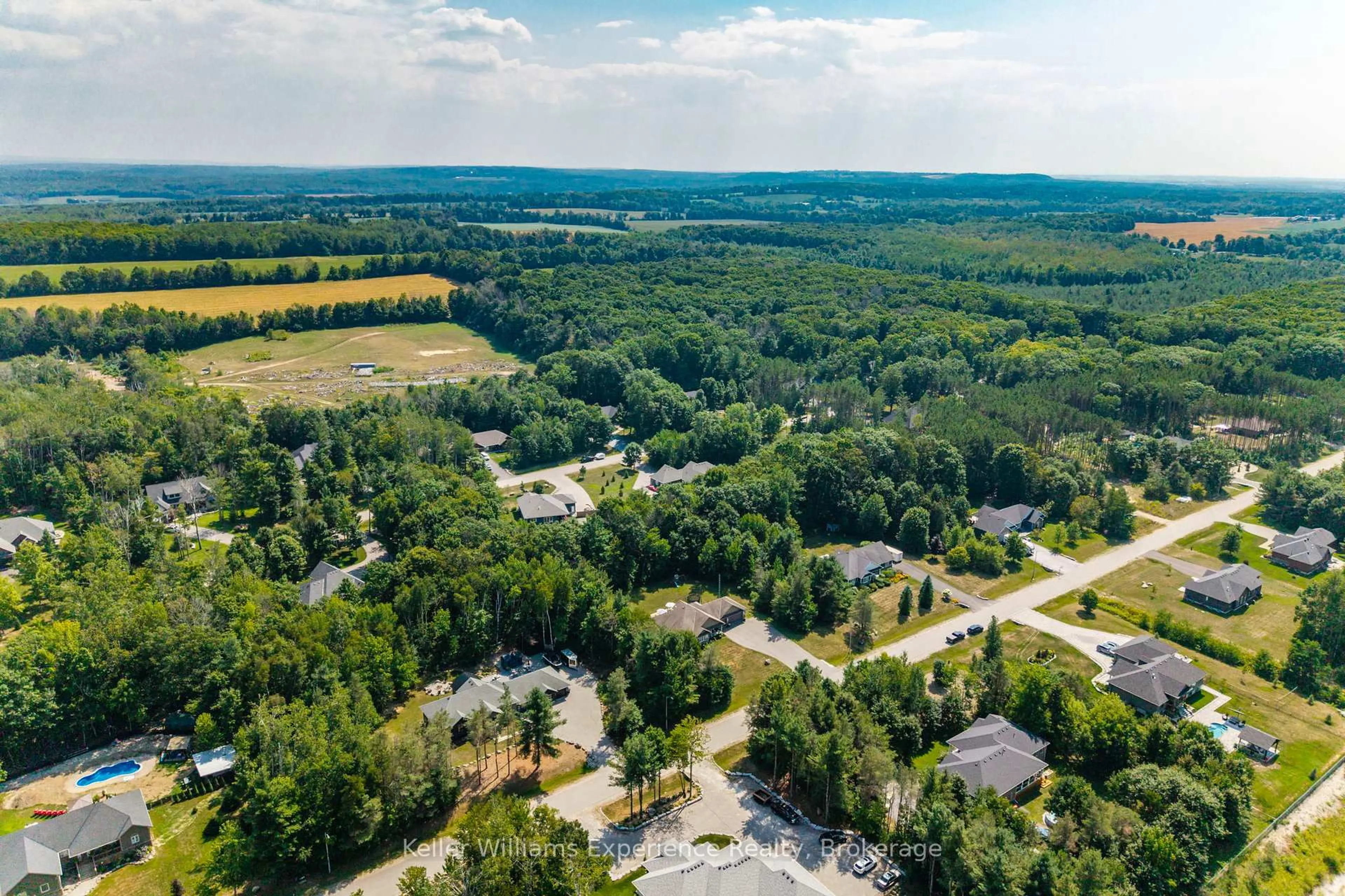 A pic from outside/outdoor area/front of a property/back of a property/a pic from drone, forest/trees view for 94 Windermere Circ, Tay Ontario L4R 0C3