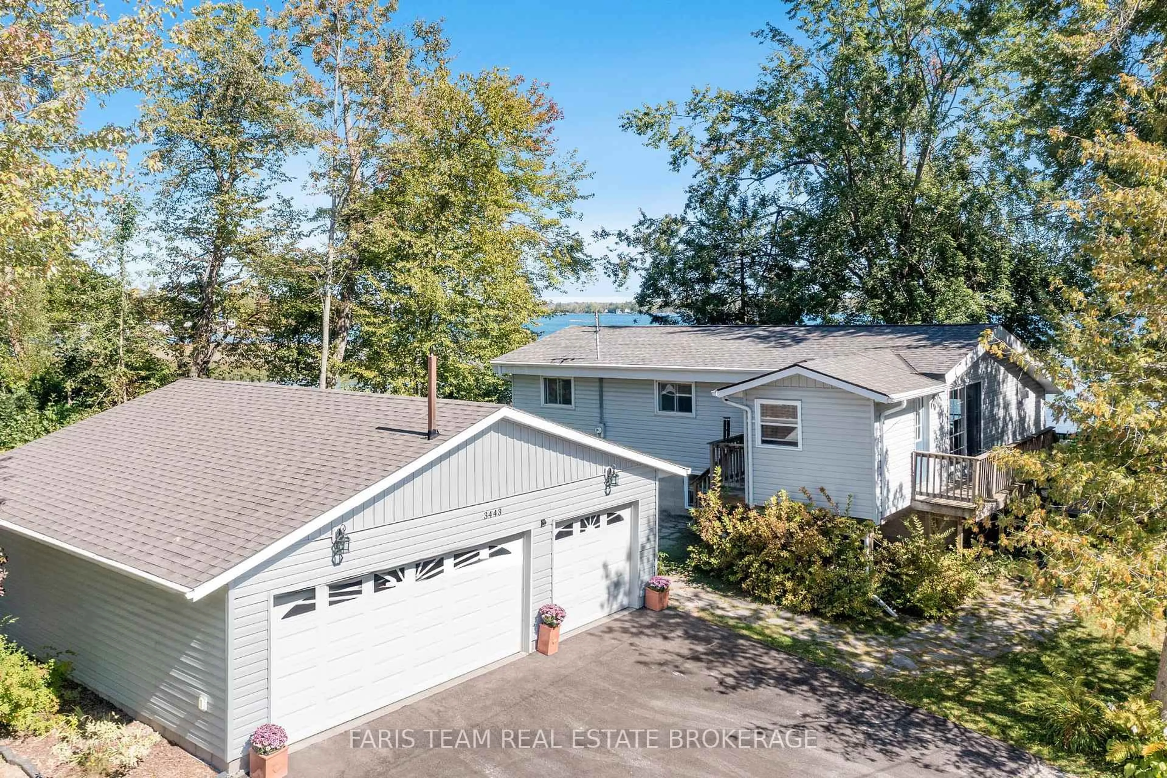 A pic from outside/outdoor area/front of a property/back of a property/a pic from drone, water/lake/river/ocean view for 3443 Lunge Point Lane, Severn Ontario L3V 7A8