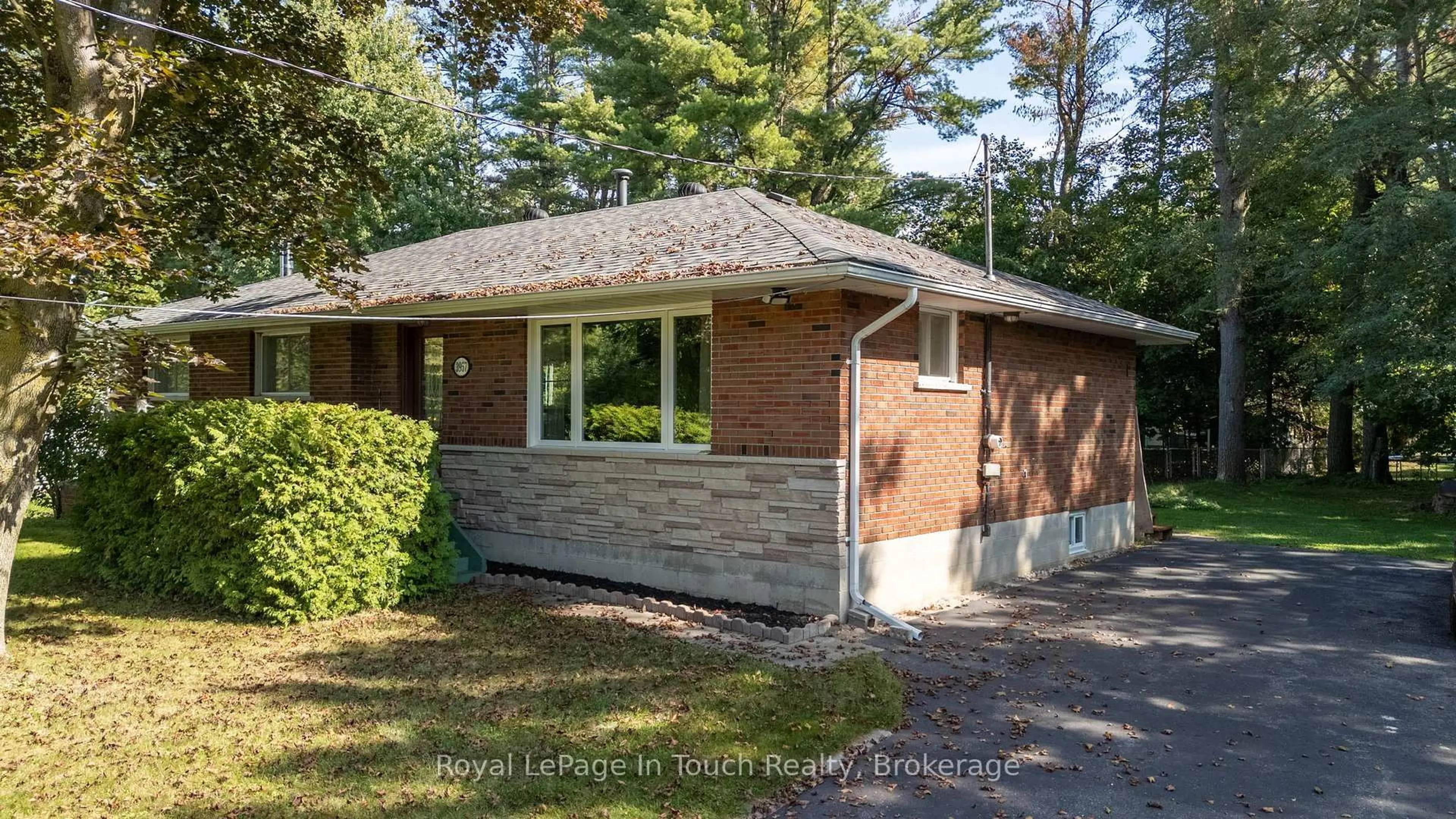 Home with brick exterior material, street for 3957 Horseshoe Valley Rd, Springwater Ontario L9X 1E9