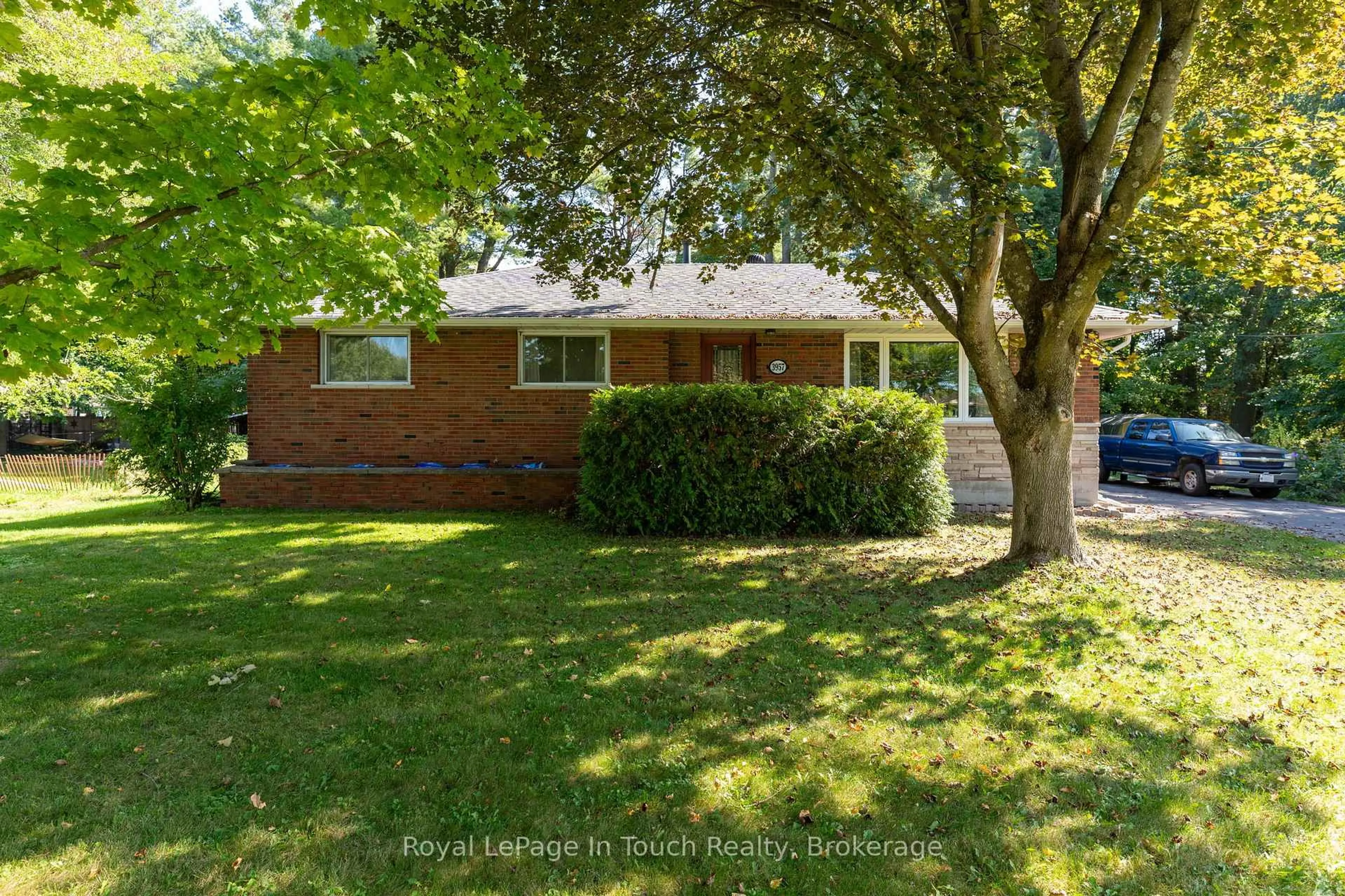 Home with brick exterior material, street for 3957 Horseshoe Valley Rd, Springwater Ontario L9X 1E9