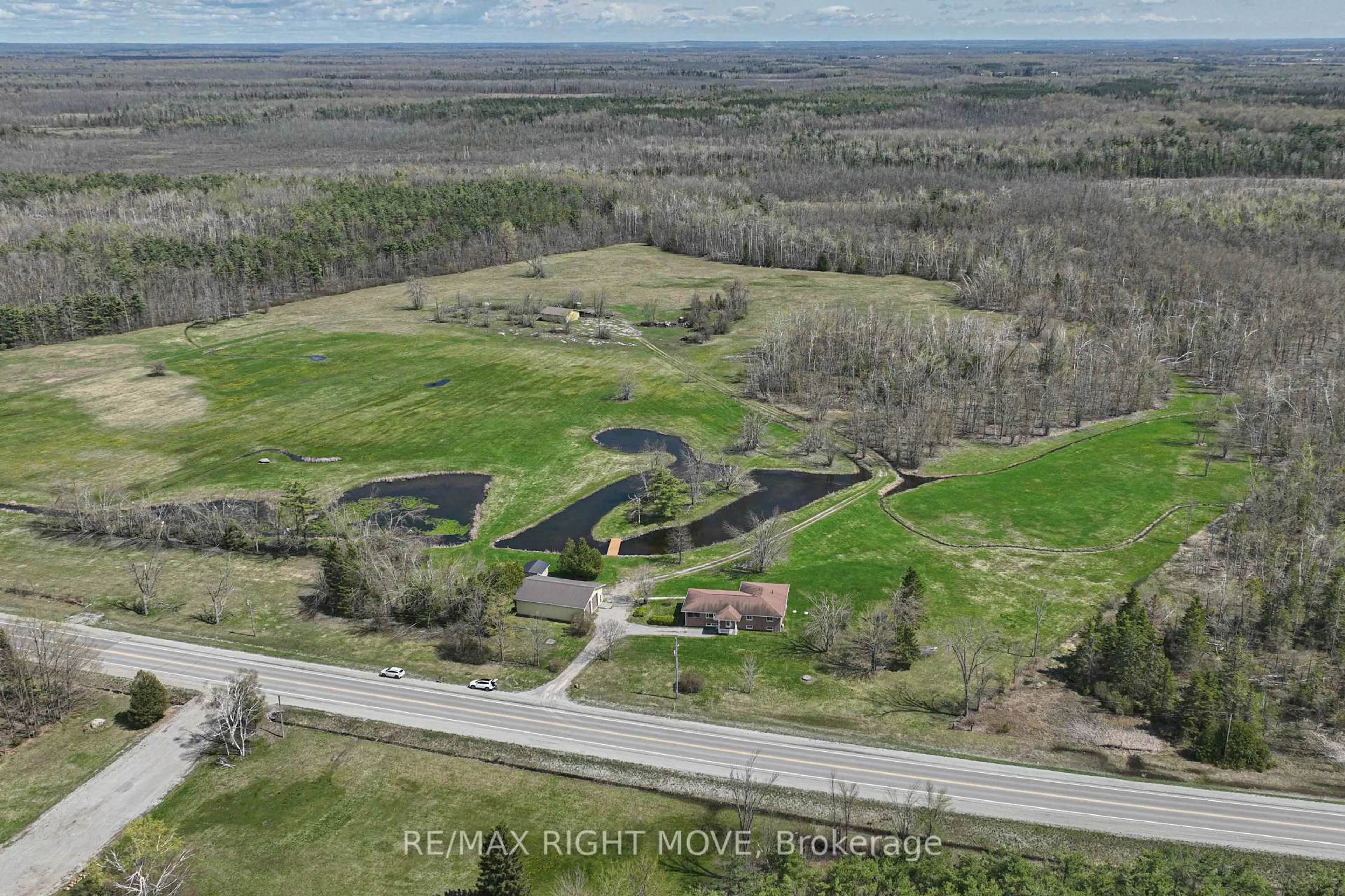 A pic from outside/outdoor area/front of a property/back of a property/a pic from drone, water/lake/river/ocean view for 2723 Monck Rd, Ramara Ontario L3V 0P6