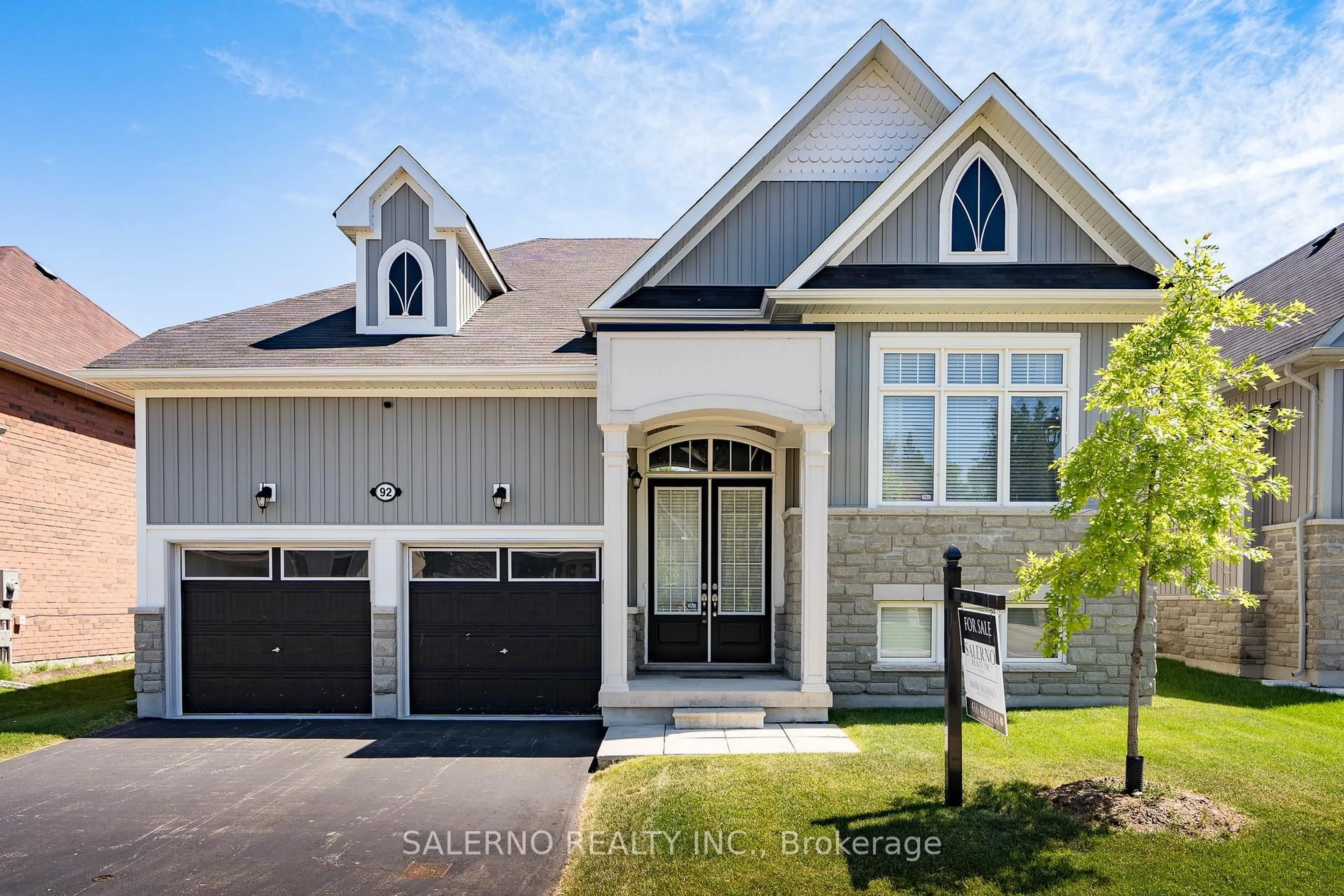 Home with vinyl exterior material, street for 92 Allegra Dr, Wasaga Beach Ontario L9Z 0H2