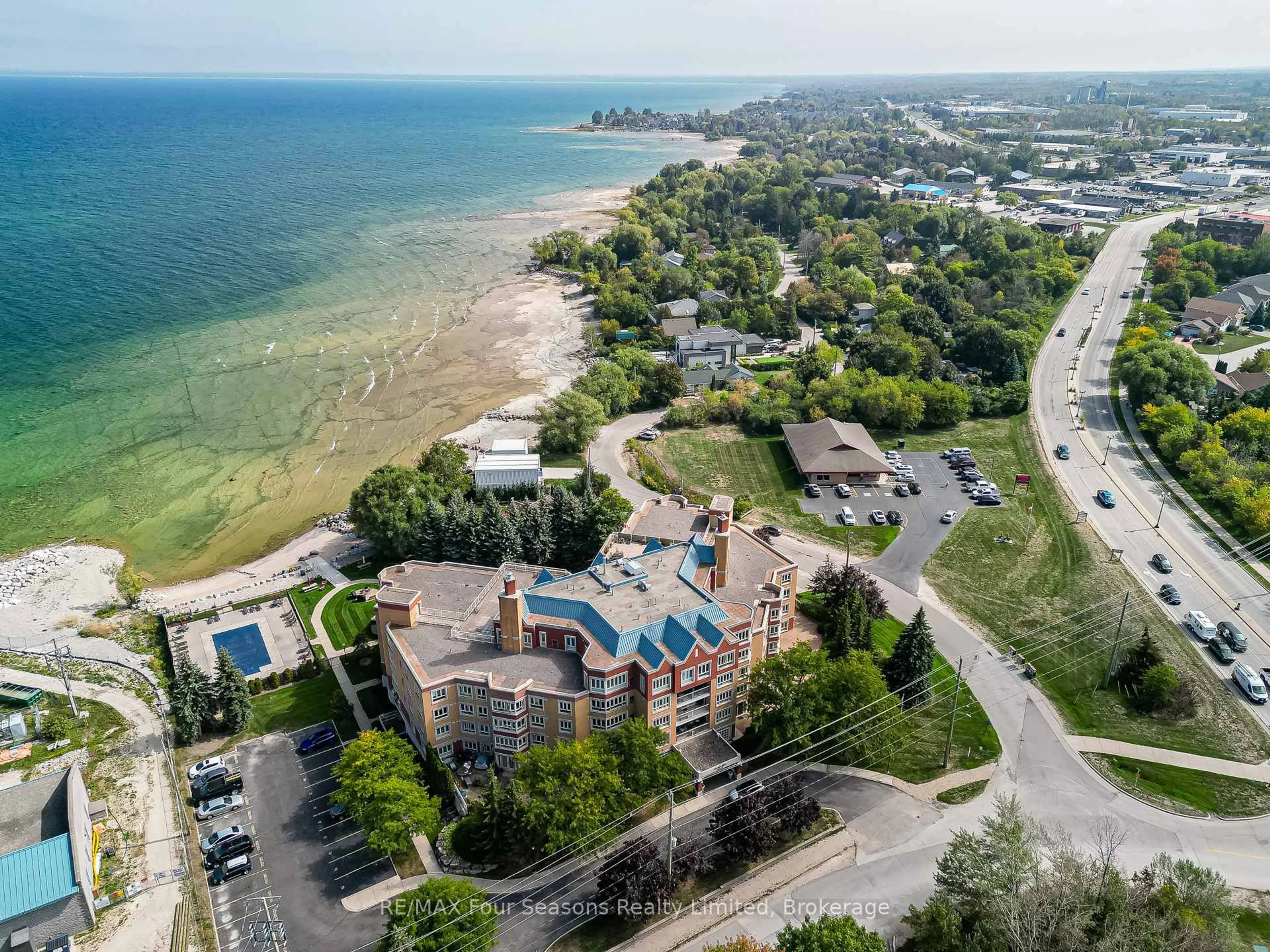 A pic from outside/outdoor area/front of a property/back of a property/a pic from drone, water/lake/river/ocean view for 16 Raglan St #310, Collingwood Ontario L9Y 4Y2