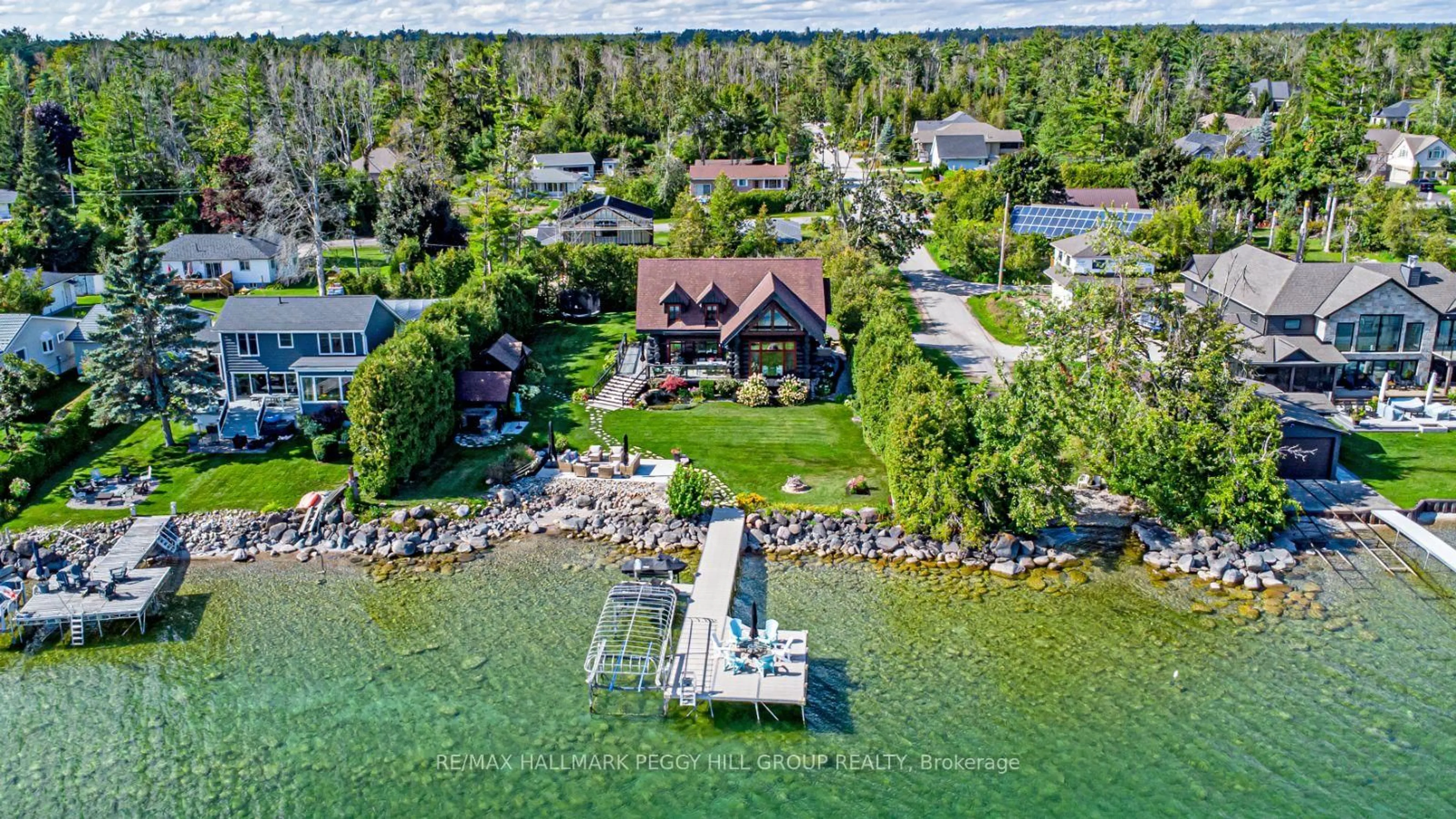 A pic from outside/outdoor area/front of a property/back of a property/a pic from drone, water/lake/river/ocean view for 2 Sunnyside Ave, Oro-Medonte Ontario L0L 2E0