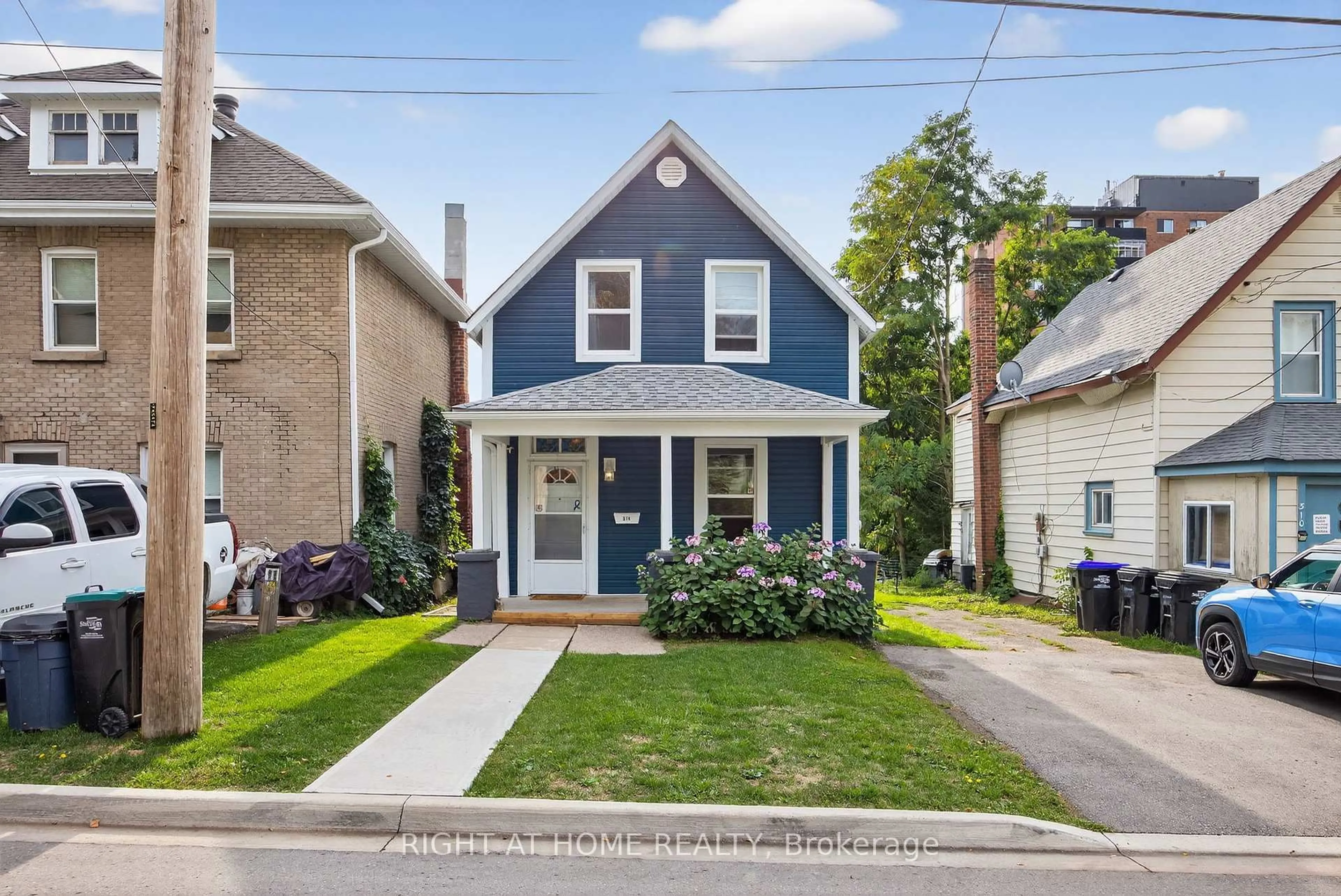 Home with brick exterior material, street for 314 Queen St, Midland Ontario L4R 3H4