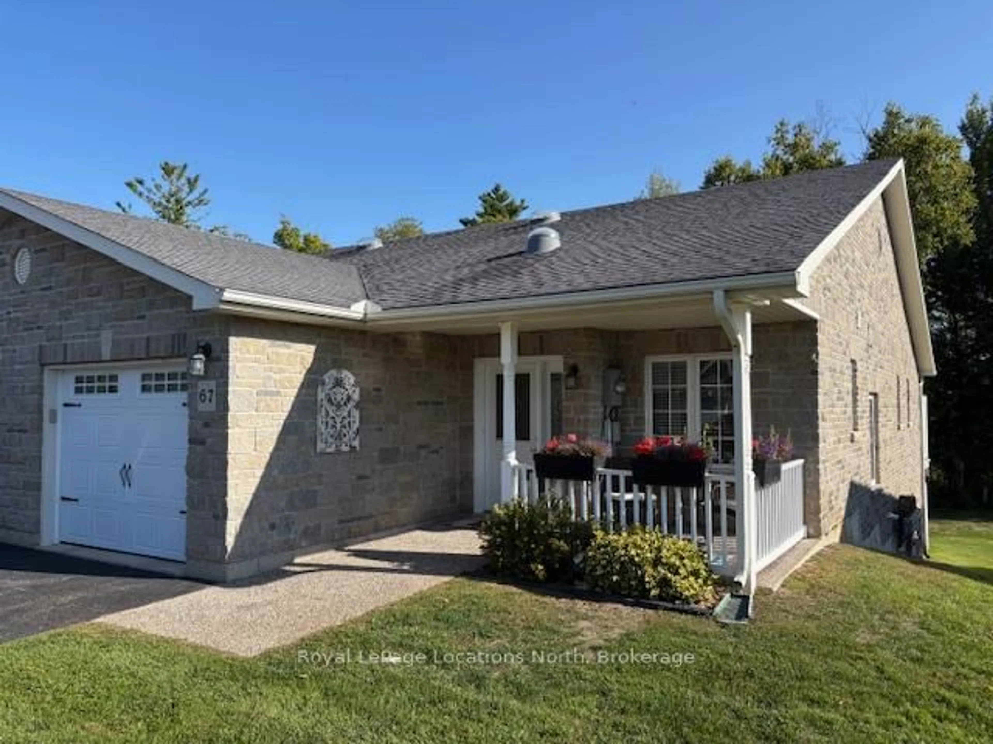 Home with brick exterior material, street for 67 Greenway Dr, Wasaga Beach Ontario L9Z 0E6