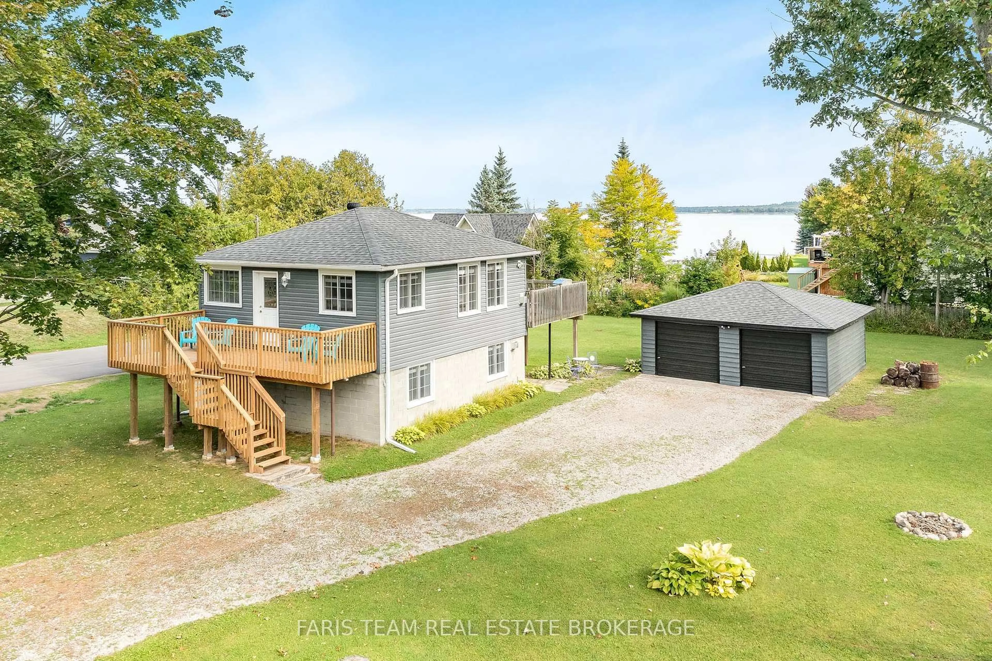 A pic from outside/outdoor area/front of a property/back of a property/a pic from drone, water/lake/river/ocean view for 11 Tanners Rd, Tay Ontario L0K 2C0