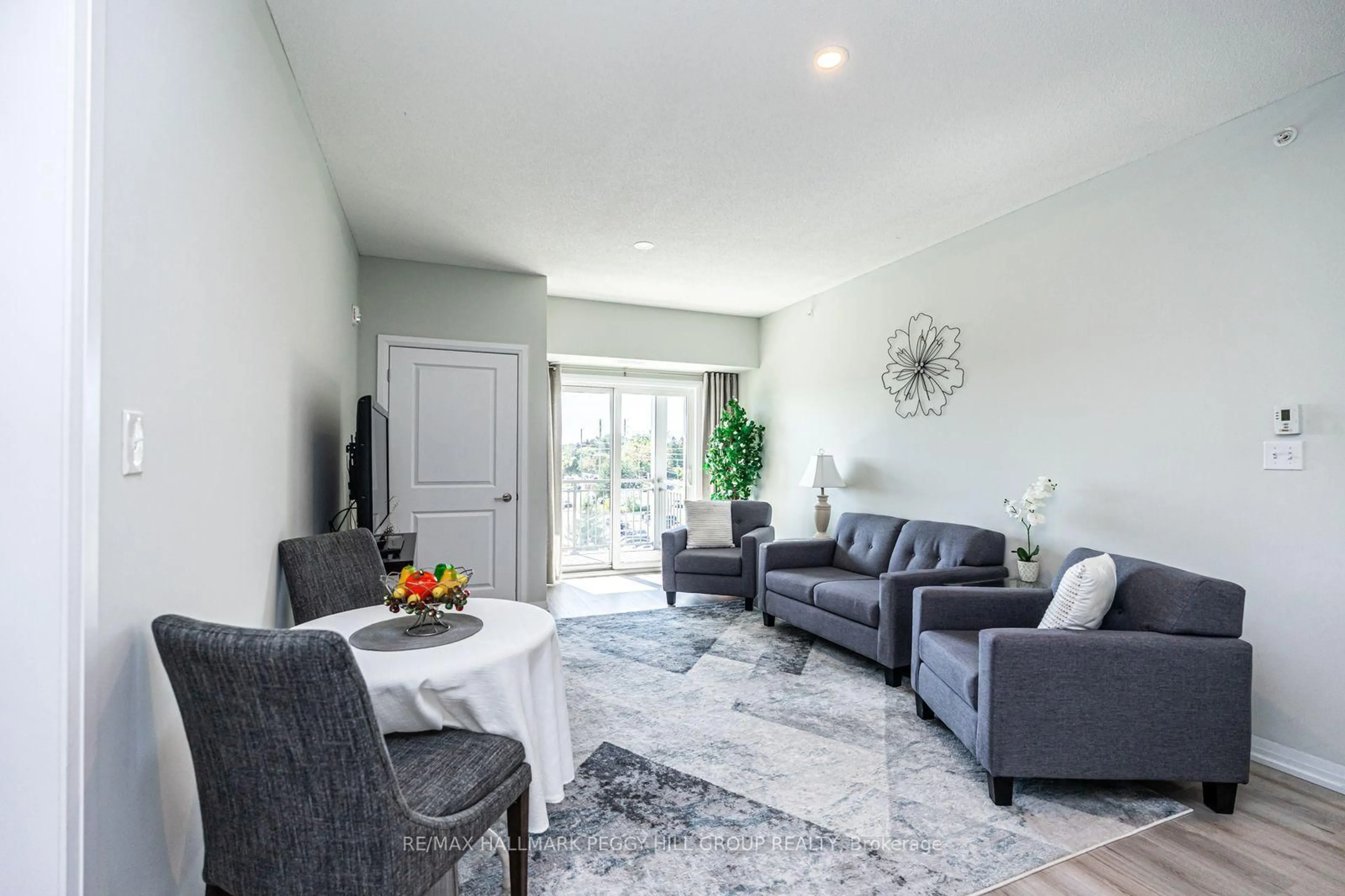 Living room with furniture, unknown for 295 Cundles Rd #404, Barrie Ontario L4M 0K8