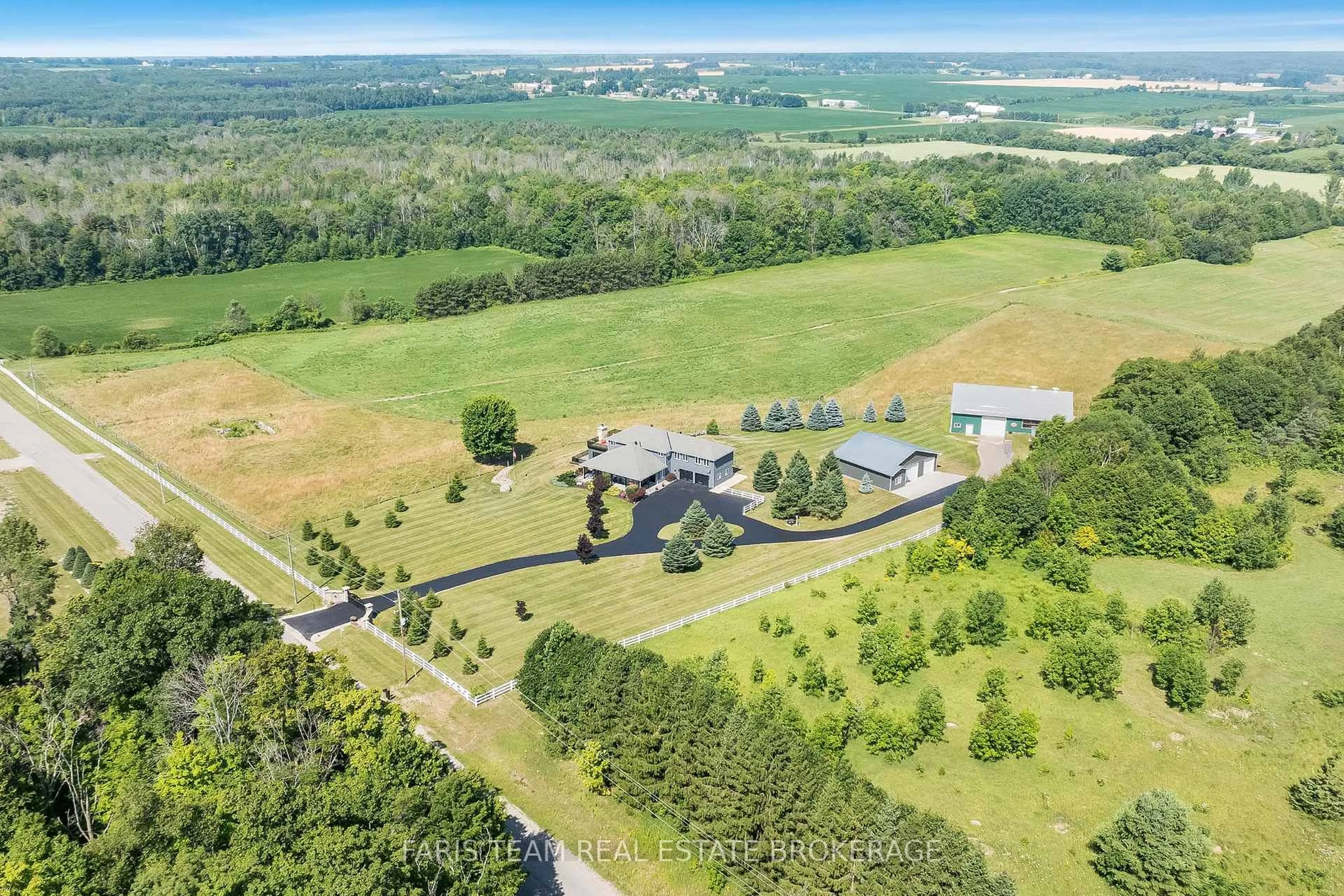 A pic from outside/outdoor area/front of a property/back of a property/a pic from drone, mountain view for 130 Concession 15, Tiny Ontario L9M 0N8