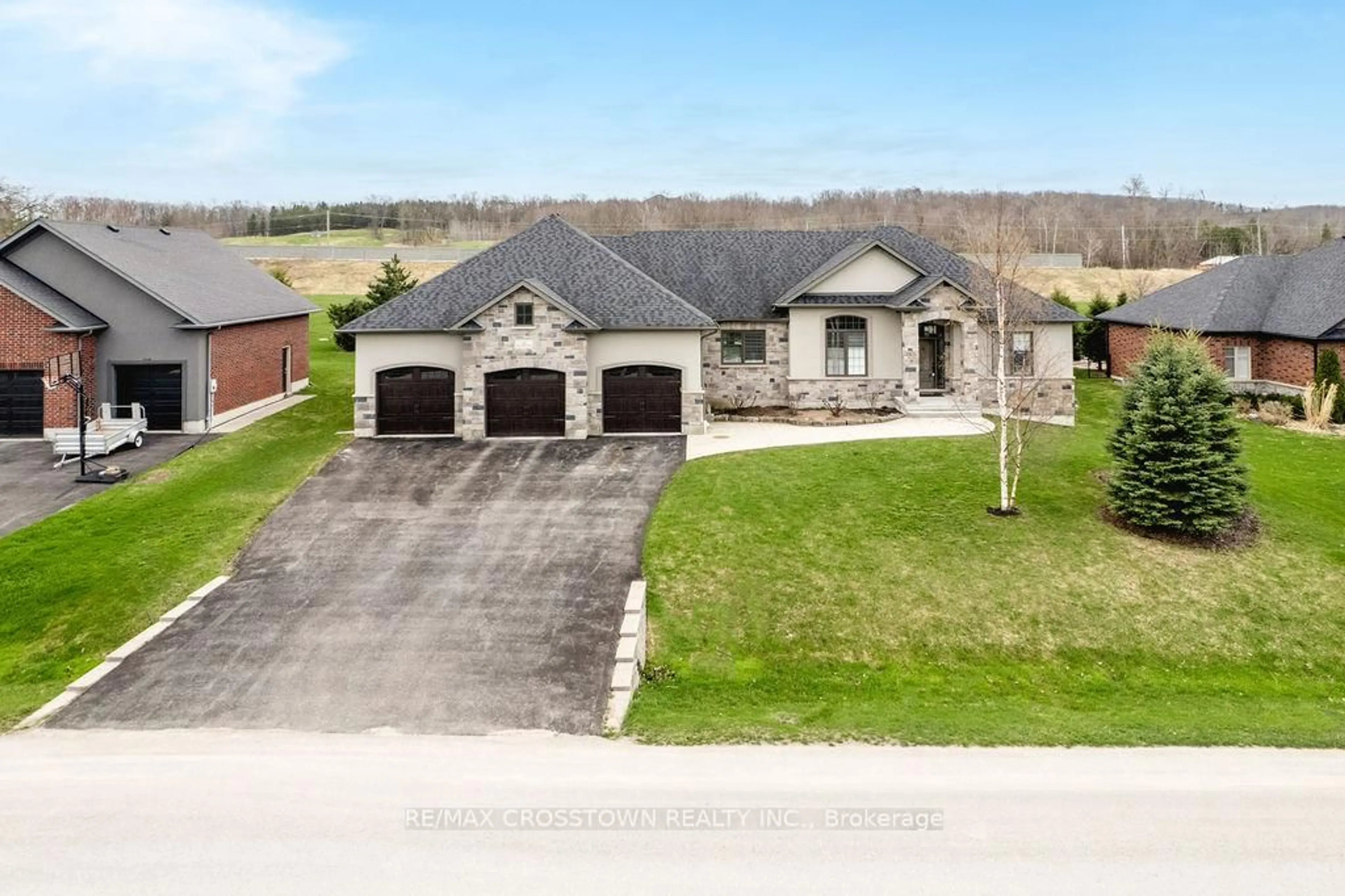 A pic from outside/outdoor area/front of a property/back of a property/a pic from drone, street for 25 MENNILL Dr, Springwater Ontario L0L 1Y3