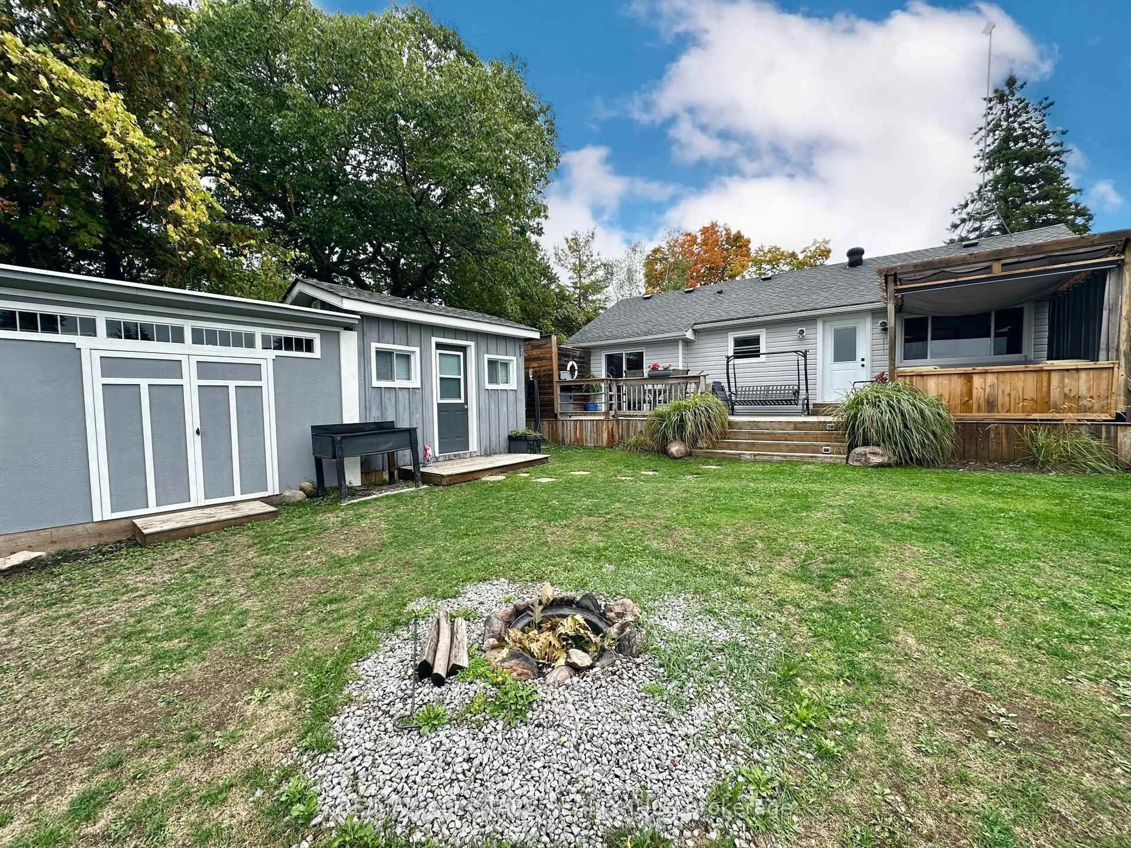 A pic from outside/outdoor area/front of a property/back of a property/a pic from drone, street for 1054 Sylvan Glen Dr, Ramara Ontario L0K 1B0