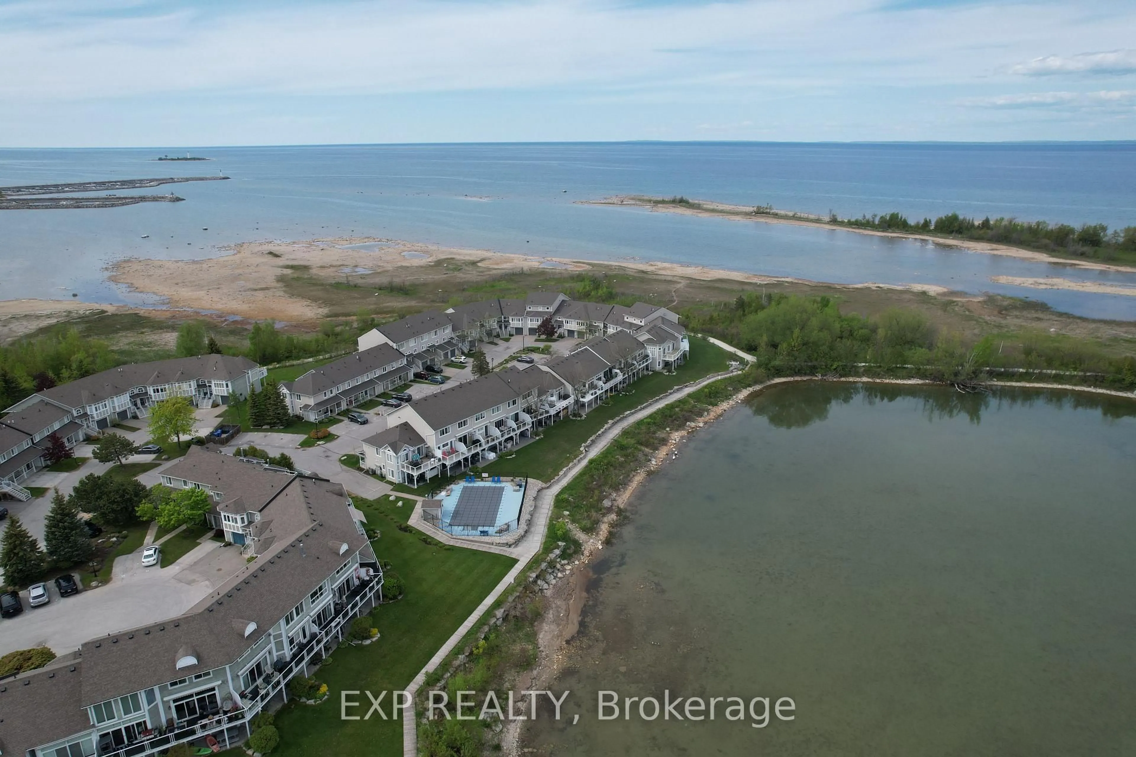 A pic from outside/outdoor area/front of a property/back of a property/a pic from drone, water/lake/river/ocean view for 22 Cranberry Surf, Collingwood Ontario L9Y 5C4