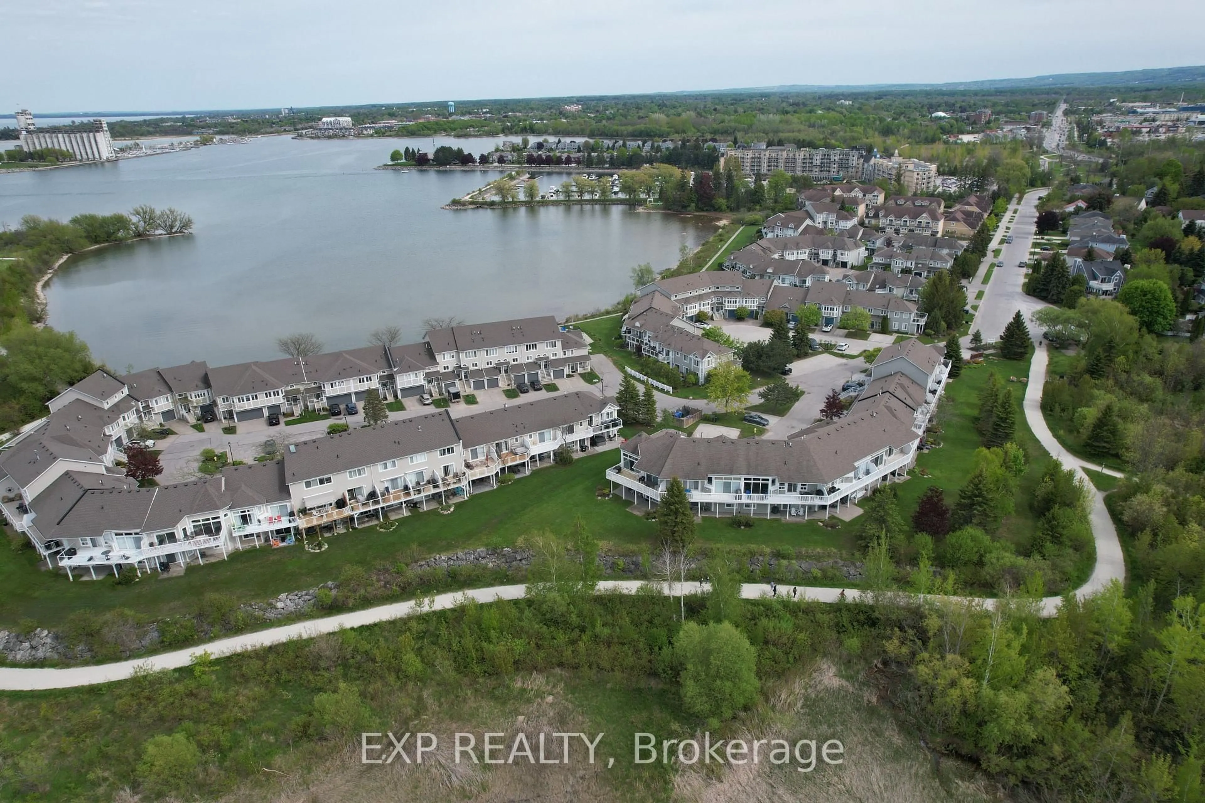 A pic from outside/outdoor area/front of a property/back of a property/a pic from drone, water/lake/river/ocean view for 22 Cranberry Surf, Collingwood Ontario L9Y 5C4