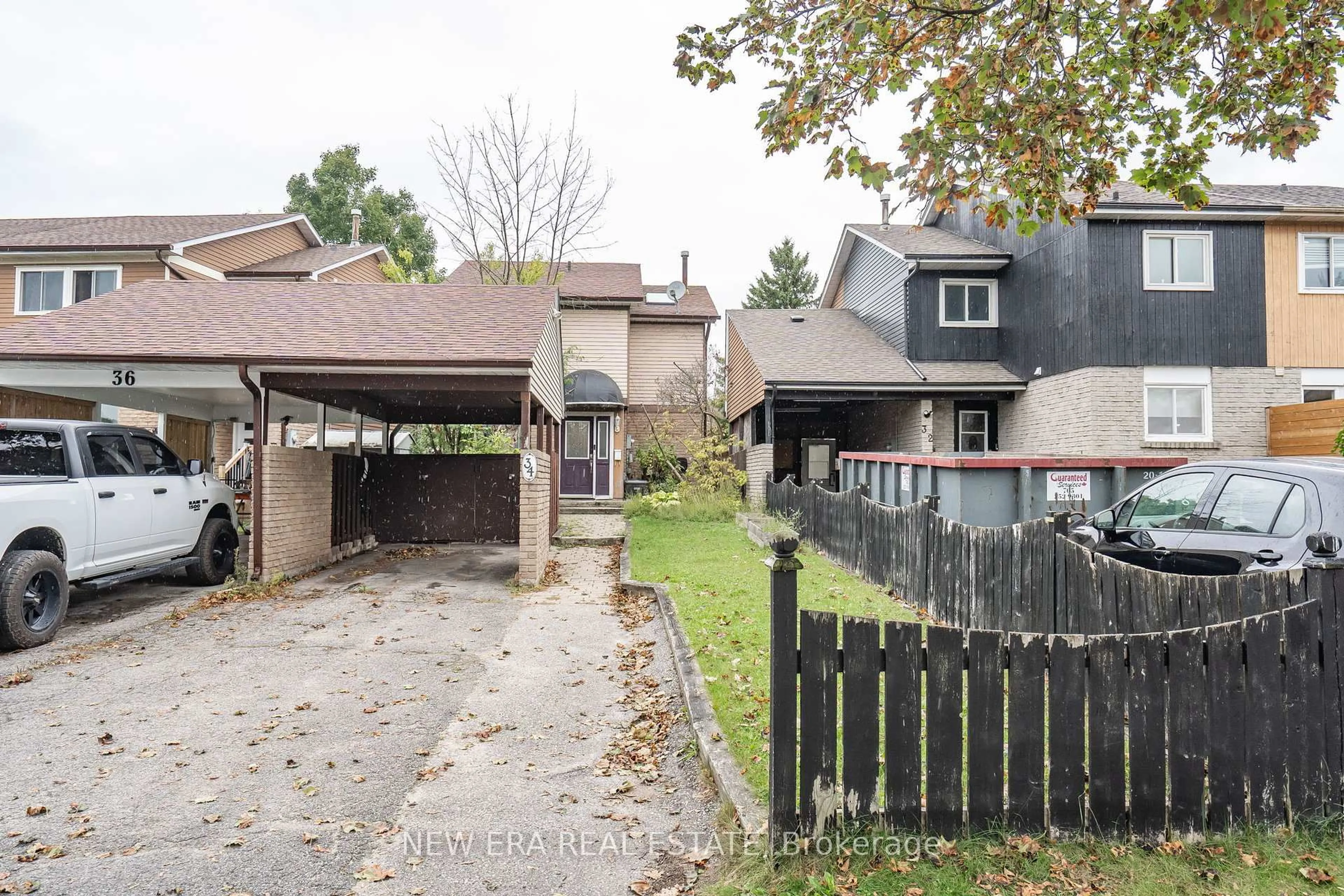 A pic from outside/outdoor area/front of a property/back of a property/a pic from drone, street for 34 LAMPMAN Lane, Barrie Ontario L4N 5B1