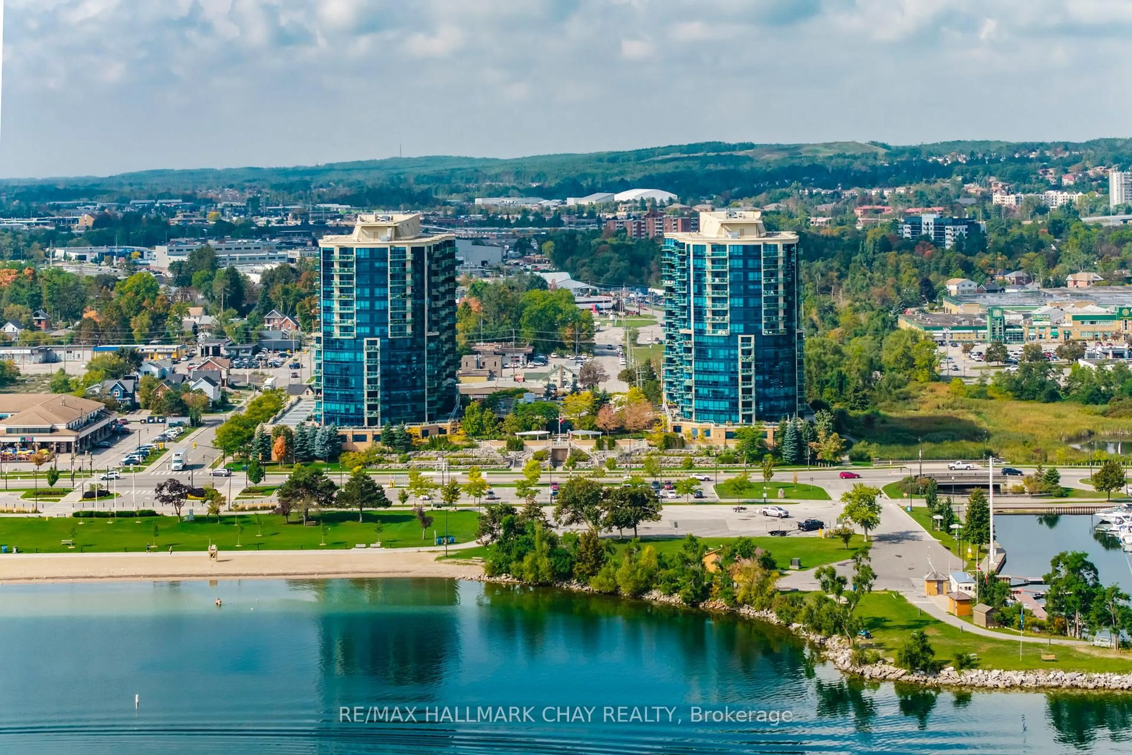A pic from outside/outdoor area/front of a property/back of a property/a pic from drone, water/lake/river/ocean view for 33 Ellen St #603, Barrie Ontario L4N 6E9