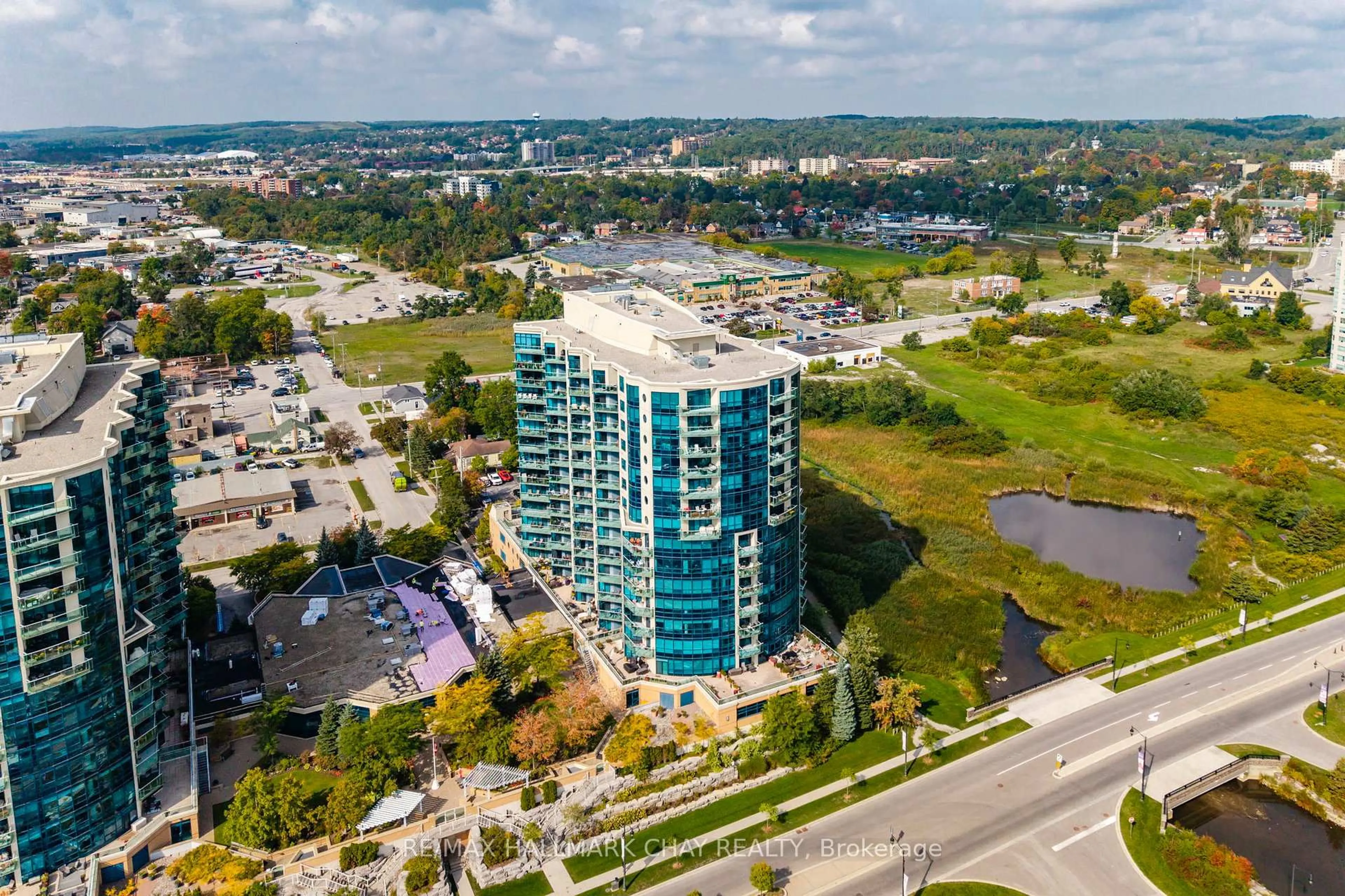 A pic from outside/outdoor area/front of a property/back of a property/a pic from drone, water/lake/river/ocean view for 33 Ellen St #603, Barrie Ontario L4N 6E9