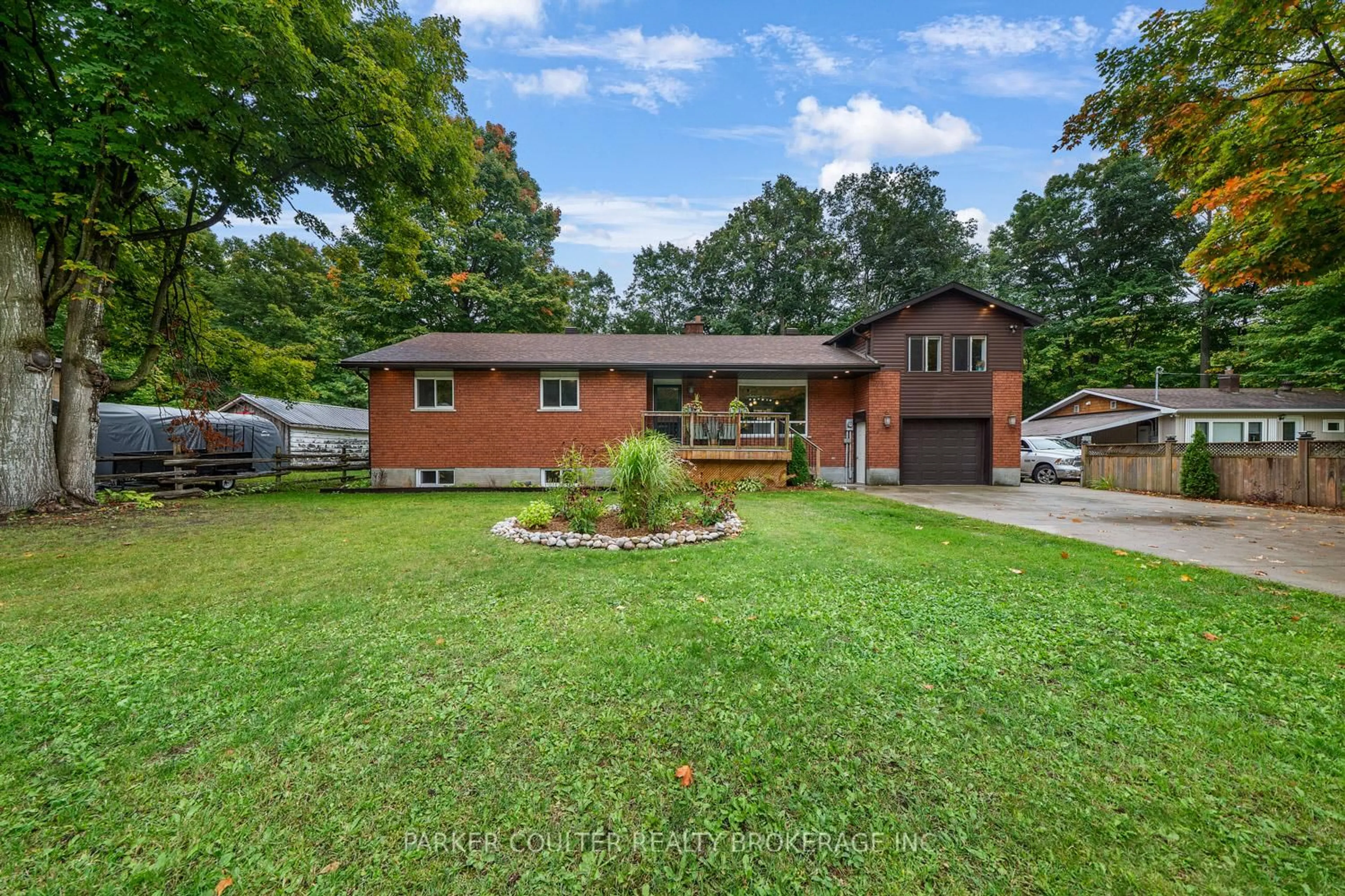 Home with brick exterior material, street for 15 Mundy Ave, Tiny Ontario L9M 0B5