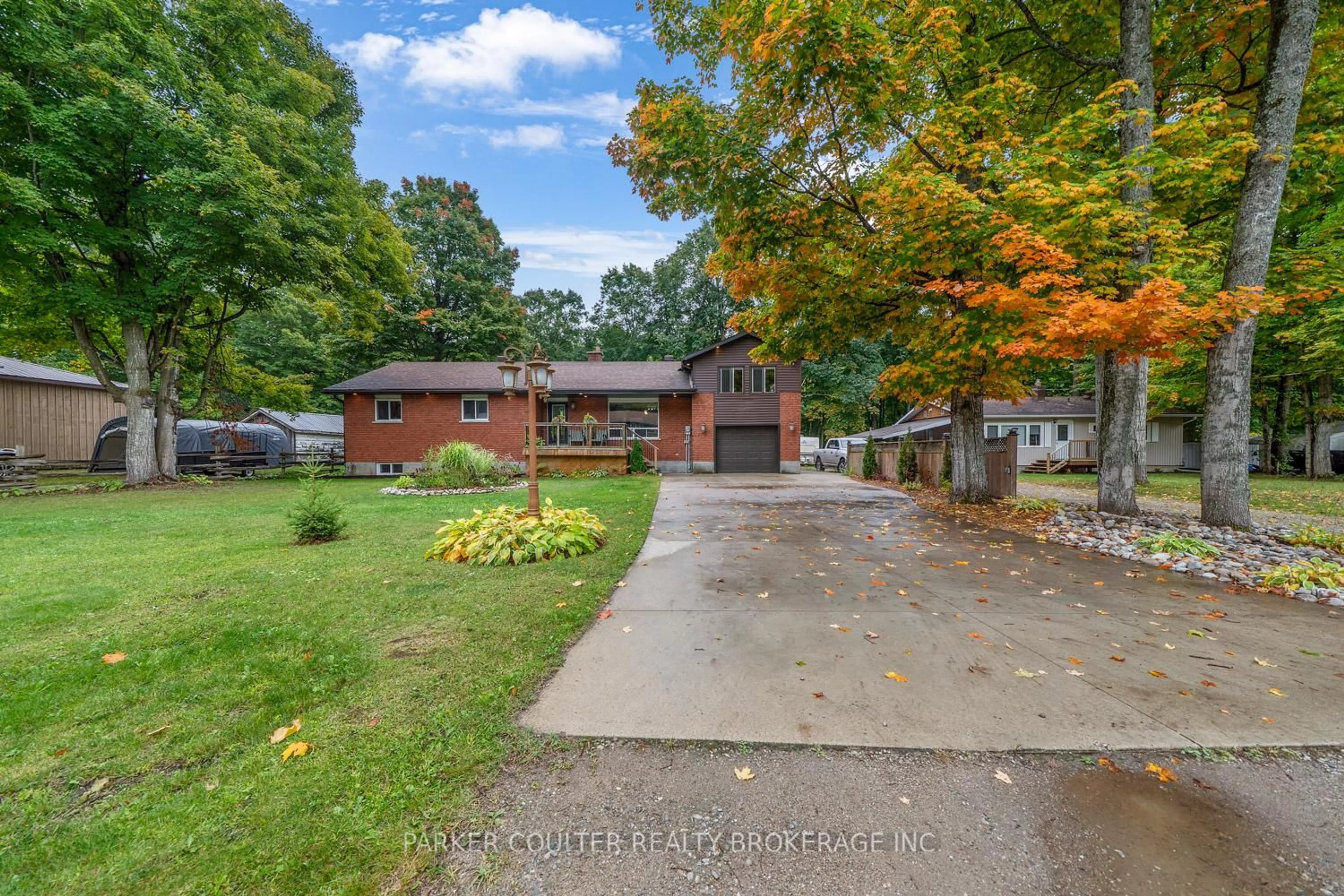 Home with brick exterior material, street for 15 Mundy Ave, Tiny Ontario L9M 0B5