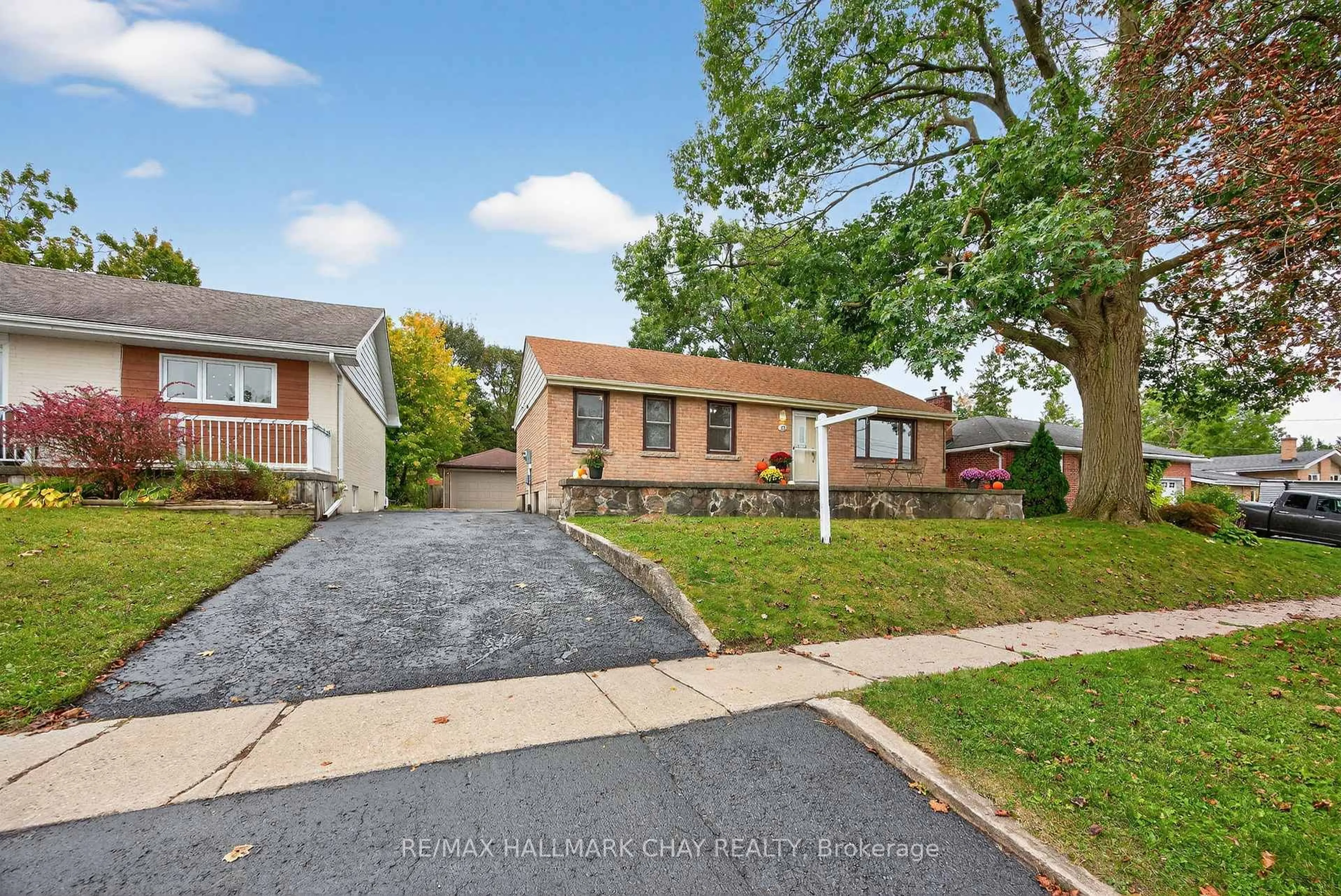 Home with brick exterior material, street for 23 Shannon St, Barrie Ontario L4M 2K7