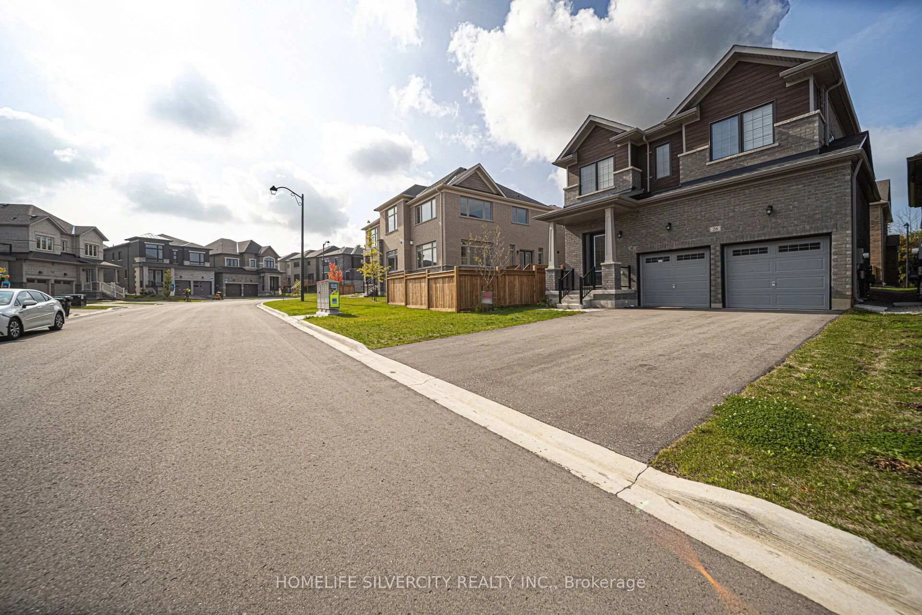 A pic from outside/outdoor area/front of a property/back of a property/a pic from drone, street for 26 Sassafrass Rd, Springwater Ontario L9X 2C6