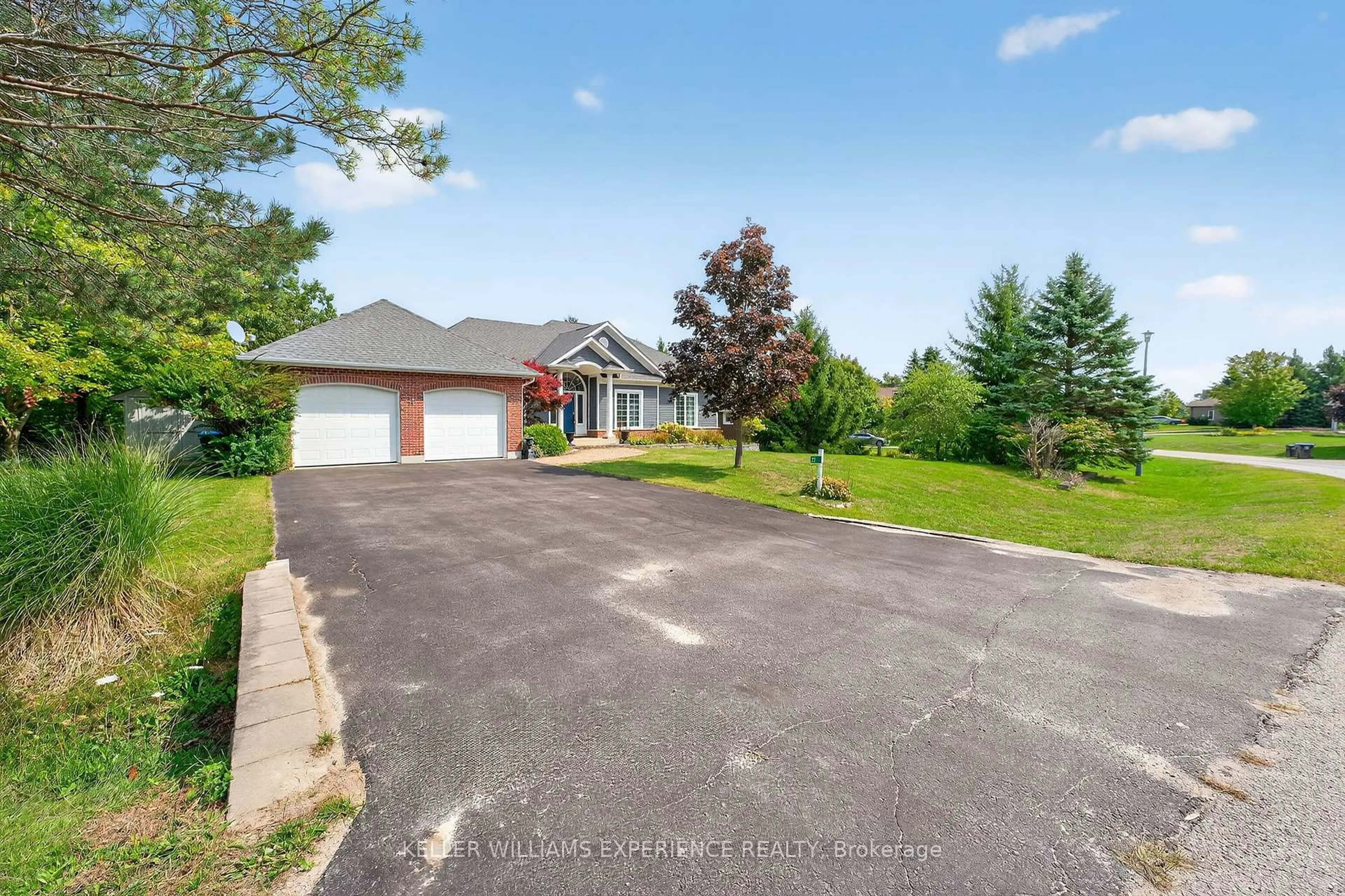 A pic from outside/outdoor area/front of a property/back of a property/a pic from drone, street for 25 Bridle Path, Oro-Medonte Ontario L0L 2L0