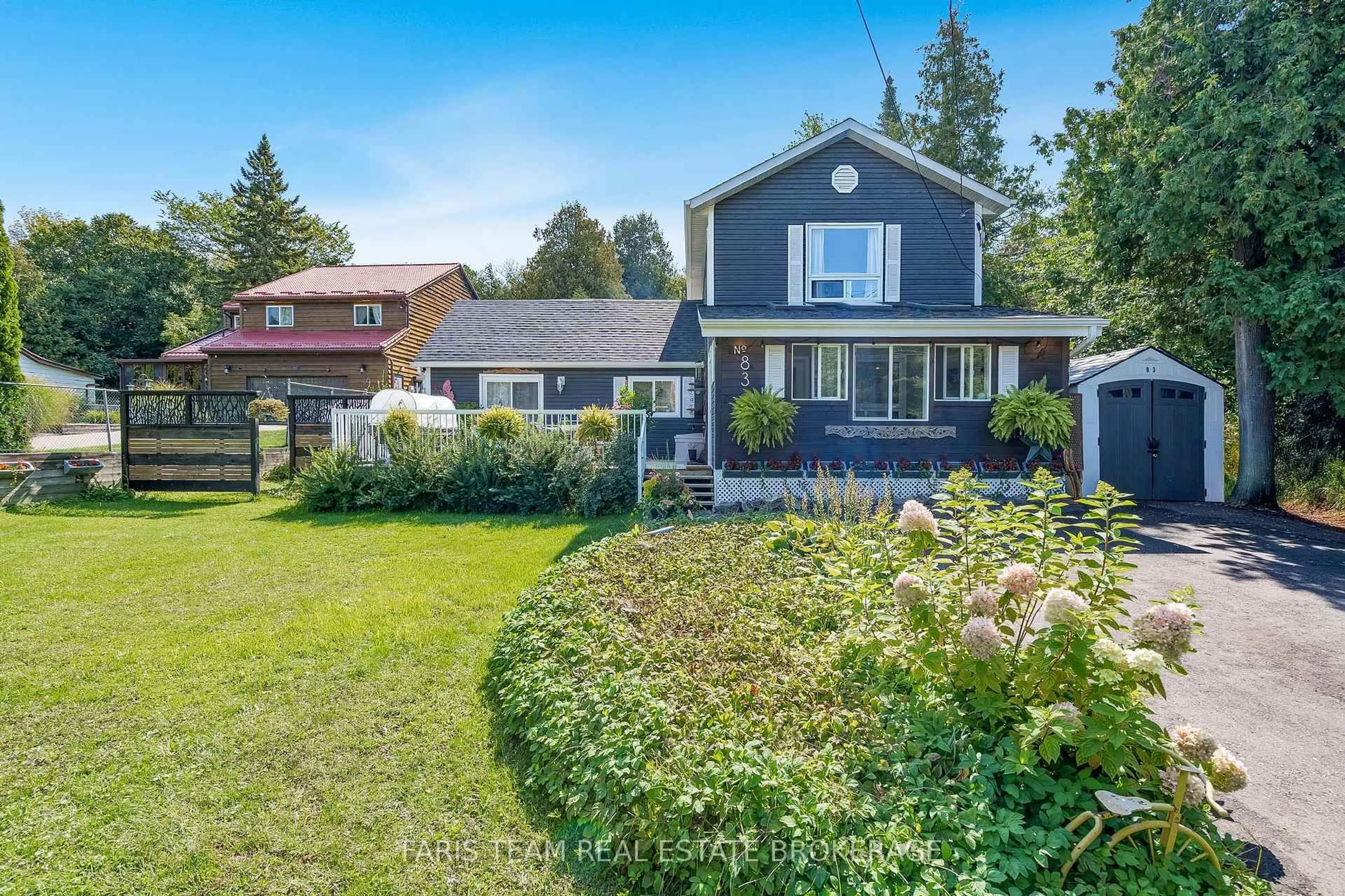A pic from outside/outdoor area/front of a property/back of a property/a pic from drone, street for 83 King Rd, Tay Ontario L0K 2C0