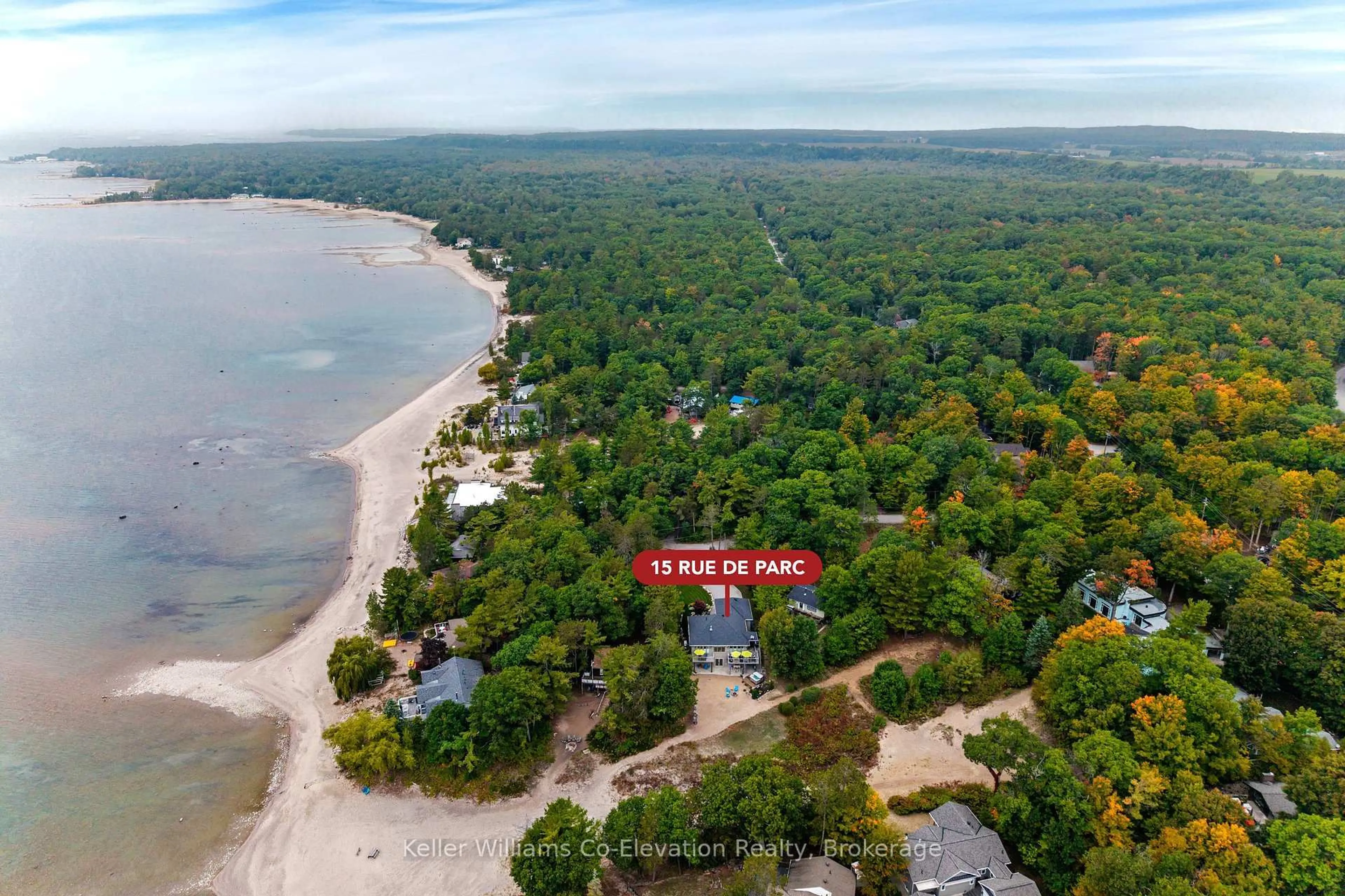 A pic from outside/outdoor area/front of a property/back of a property/a pic from drone, water/lake/river/ocean view for 15 Rue de Parc, Tiny Ontario L9M 0H4