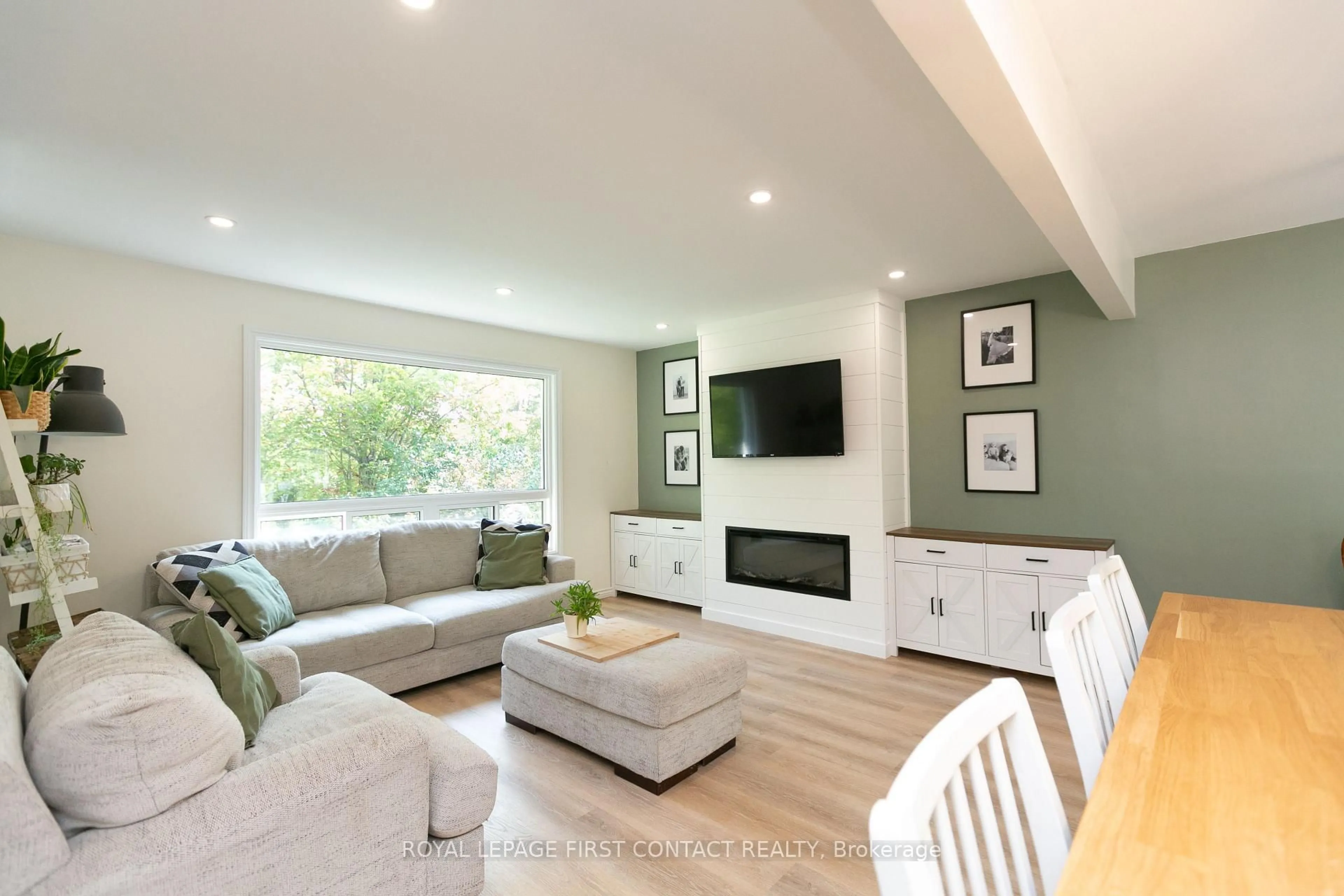 Living room with furniture, wood/laminate floor for 5532 Old Udney Sdrd, Ramara Ontario L3V 0P6