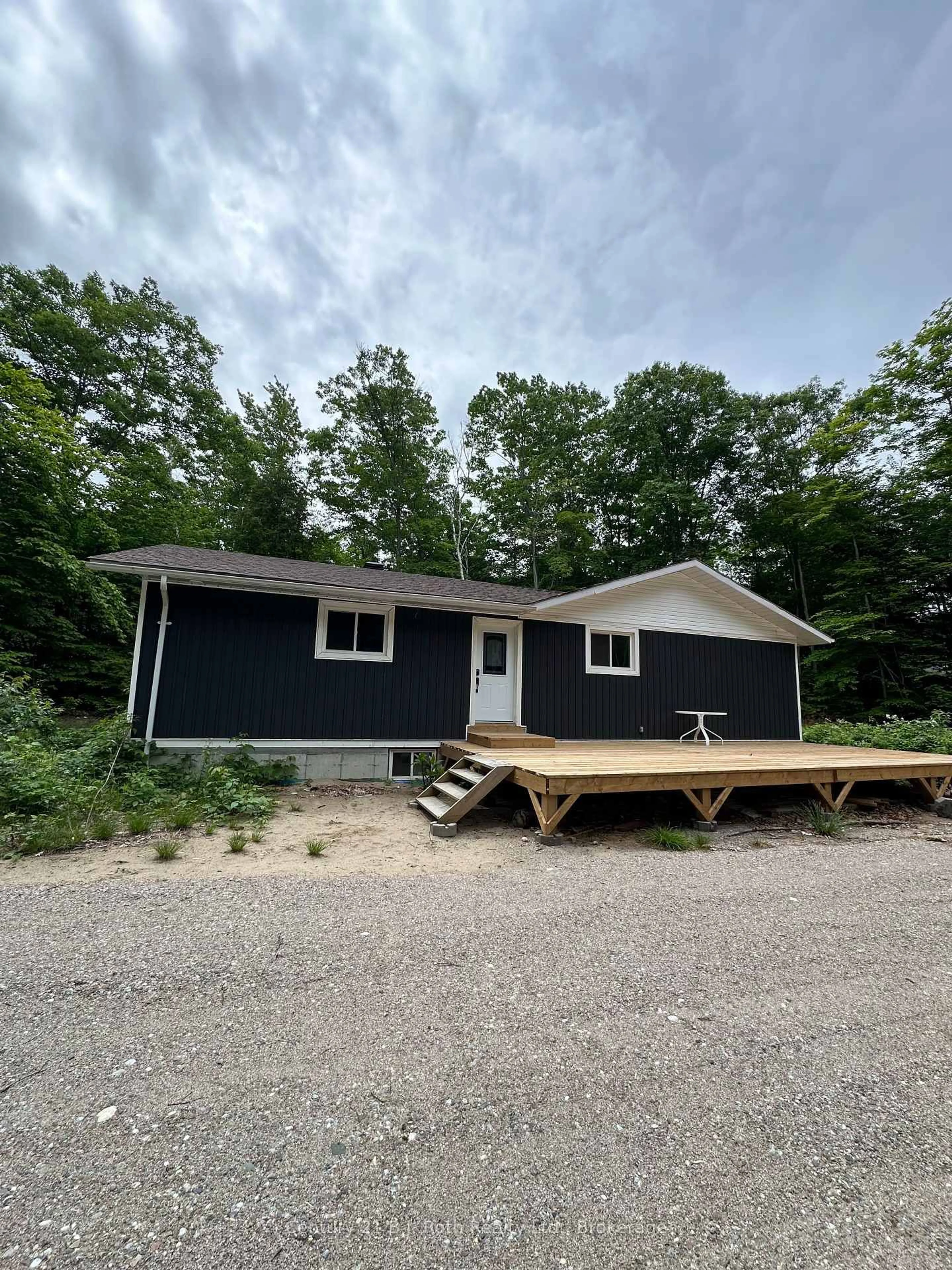 Home with vinyl exterior material, building for 1 Waagosh Miikans Lane, Christian Island 30 Ontario L9M 0A9