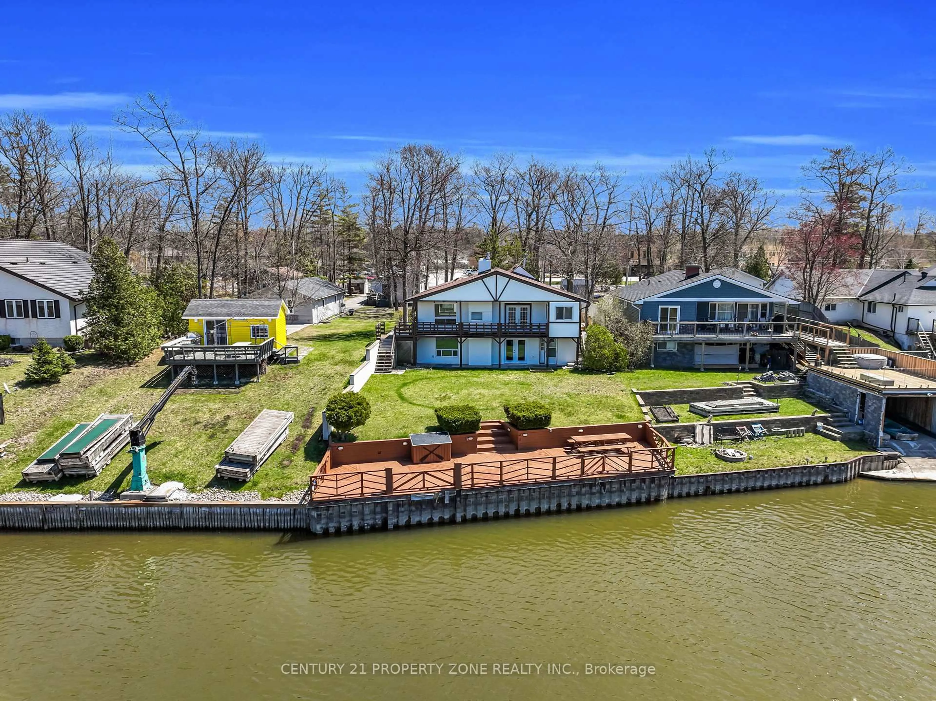 A pic from outside/outdoor area/front of a property/back of a property/a pic from drone, water/lake/river/ocean view for 1312 River Rd, Wasaga Beach Ontario L9Z 2W6