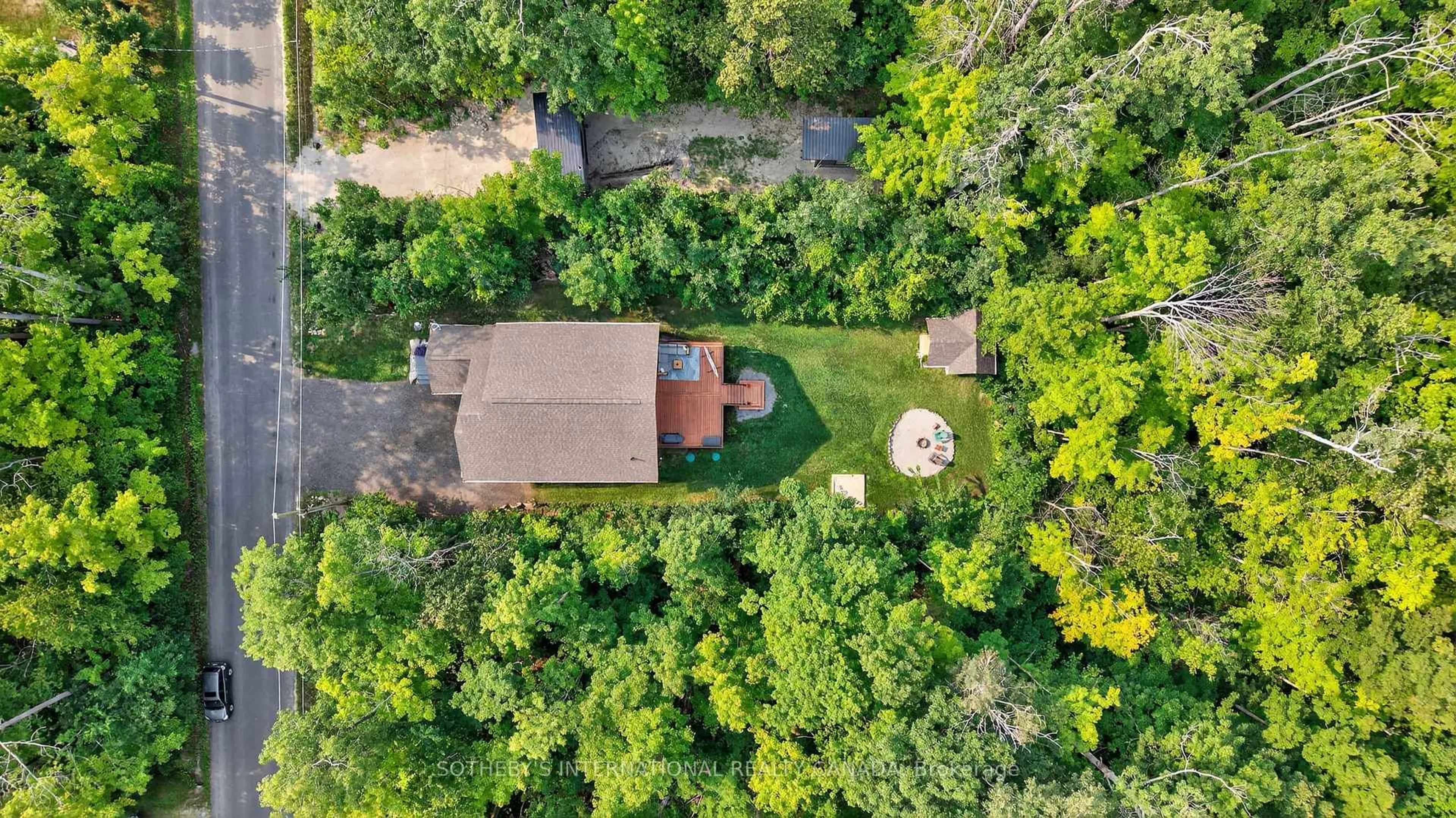 A pic from outside/outdoor area/front of a property/back of a property/a pic from drone, forest/trees view for 73 Wozniak Rd, Penetanguishene Ontario L9M 1W6