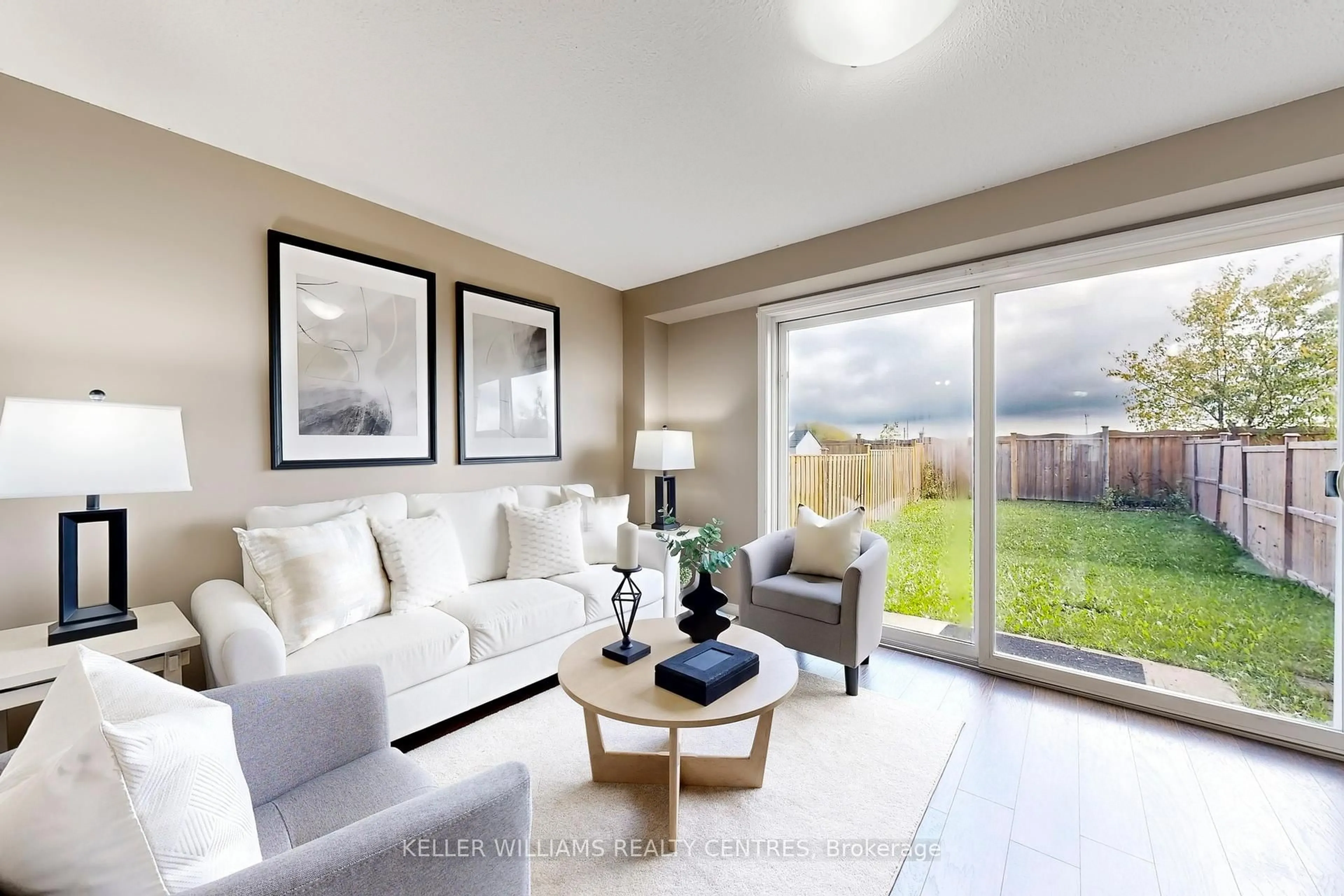 Living room with furniture, unknown for 69 Goodwin Dr, Barrie Ontario L4N 5Z8